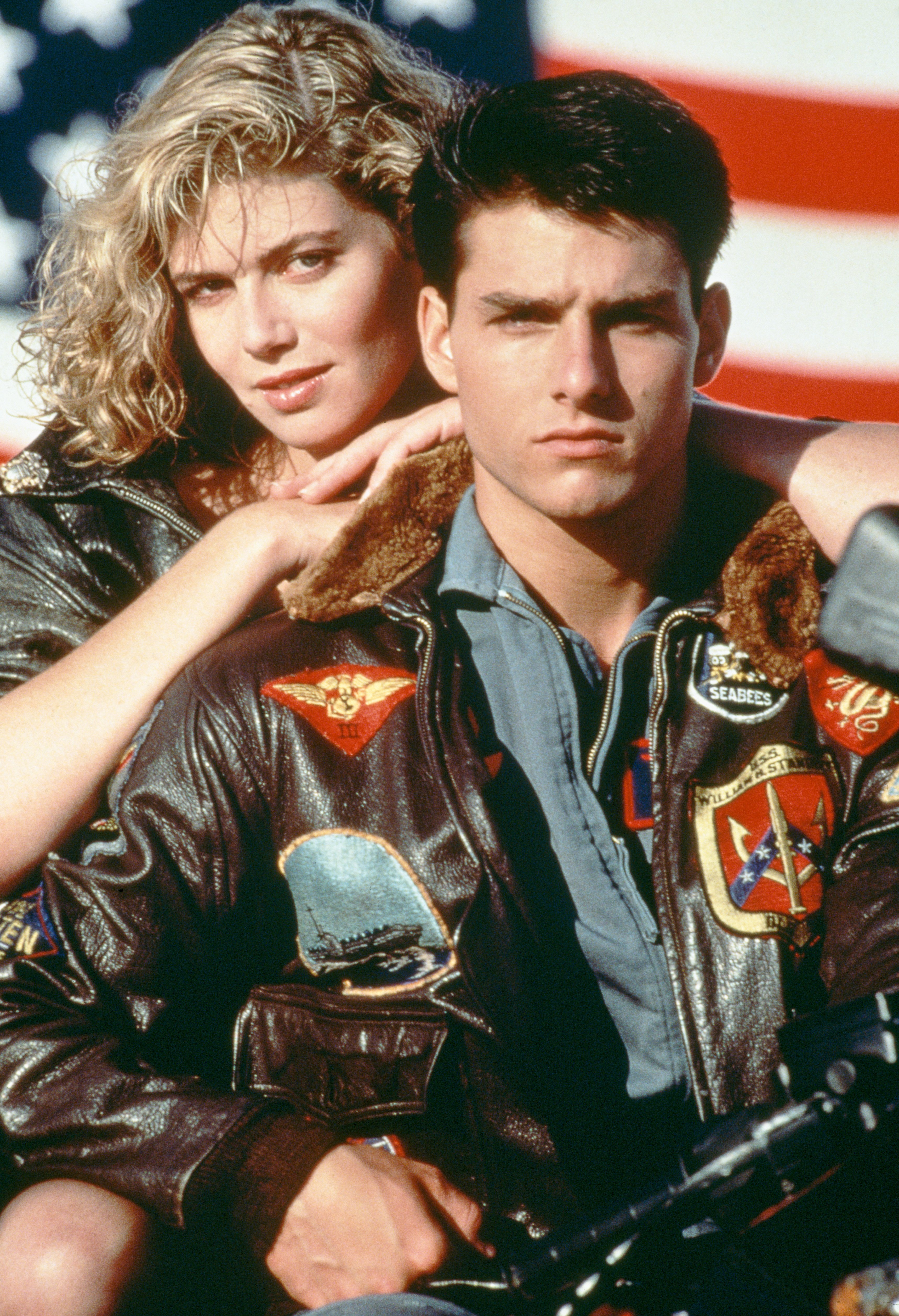 Tom Cruis as Lieutenant Pete 'Maverick' Mitchell and Kelly McGillis as Charlotte 'Charlie' Blackwood in a promotional portrait for "Top Gun" | Photo: Paramount Pictures/Archive Photos/Getty Images