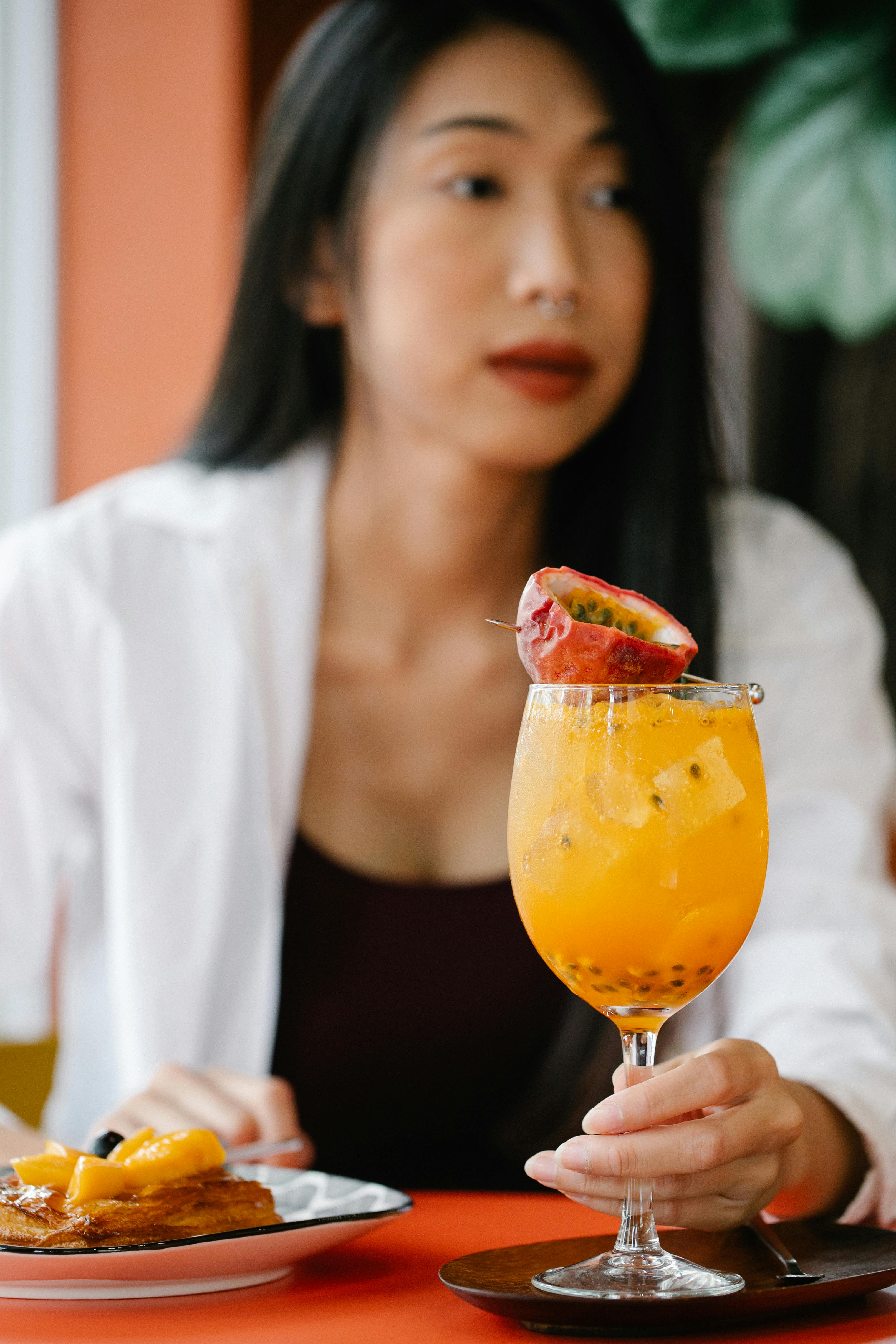 A woman looking unimpressed in a restaurant | Source: Pexels