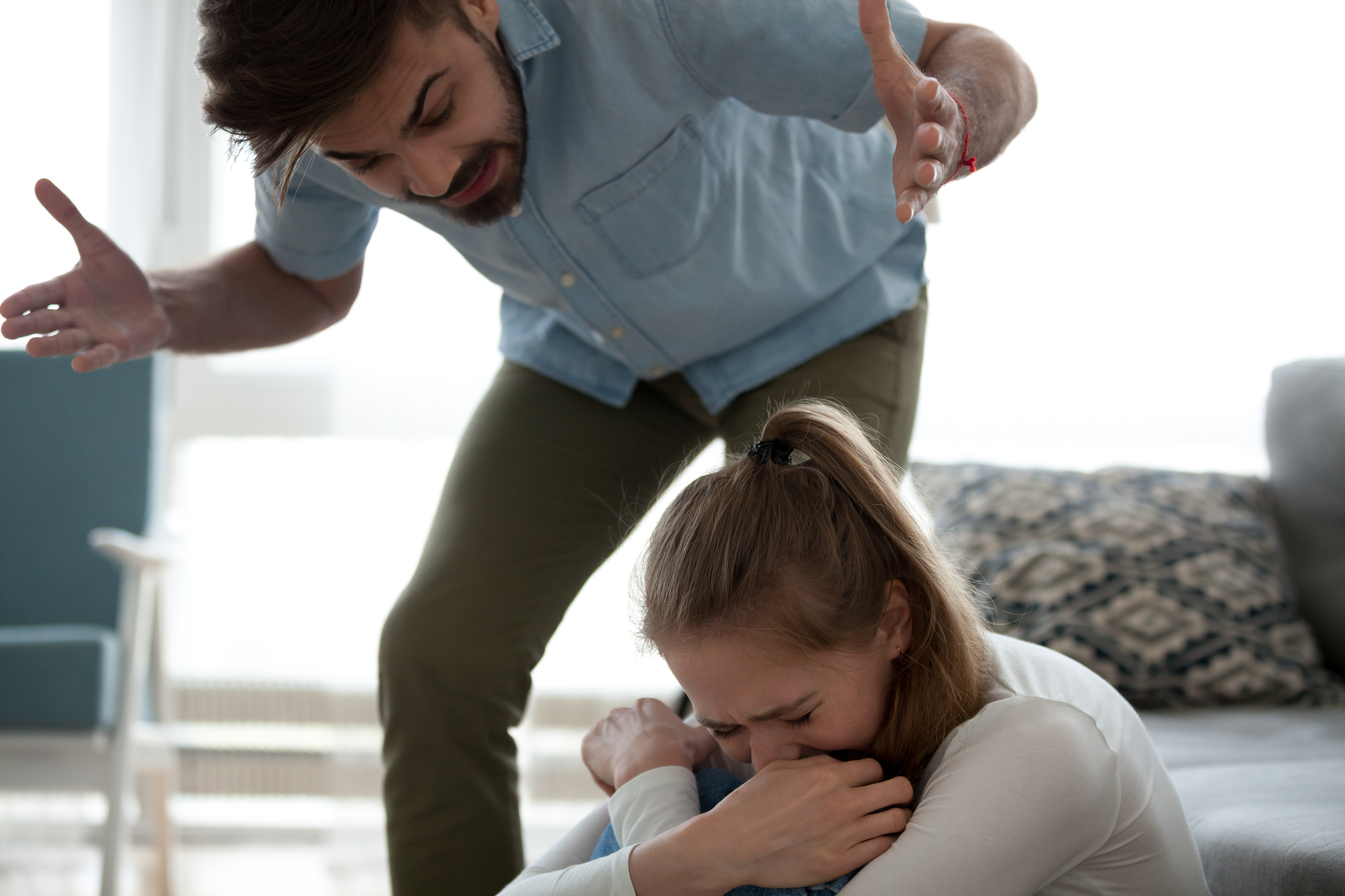 A man shouting at a woman | Source: Shutterstock