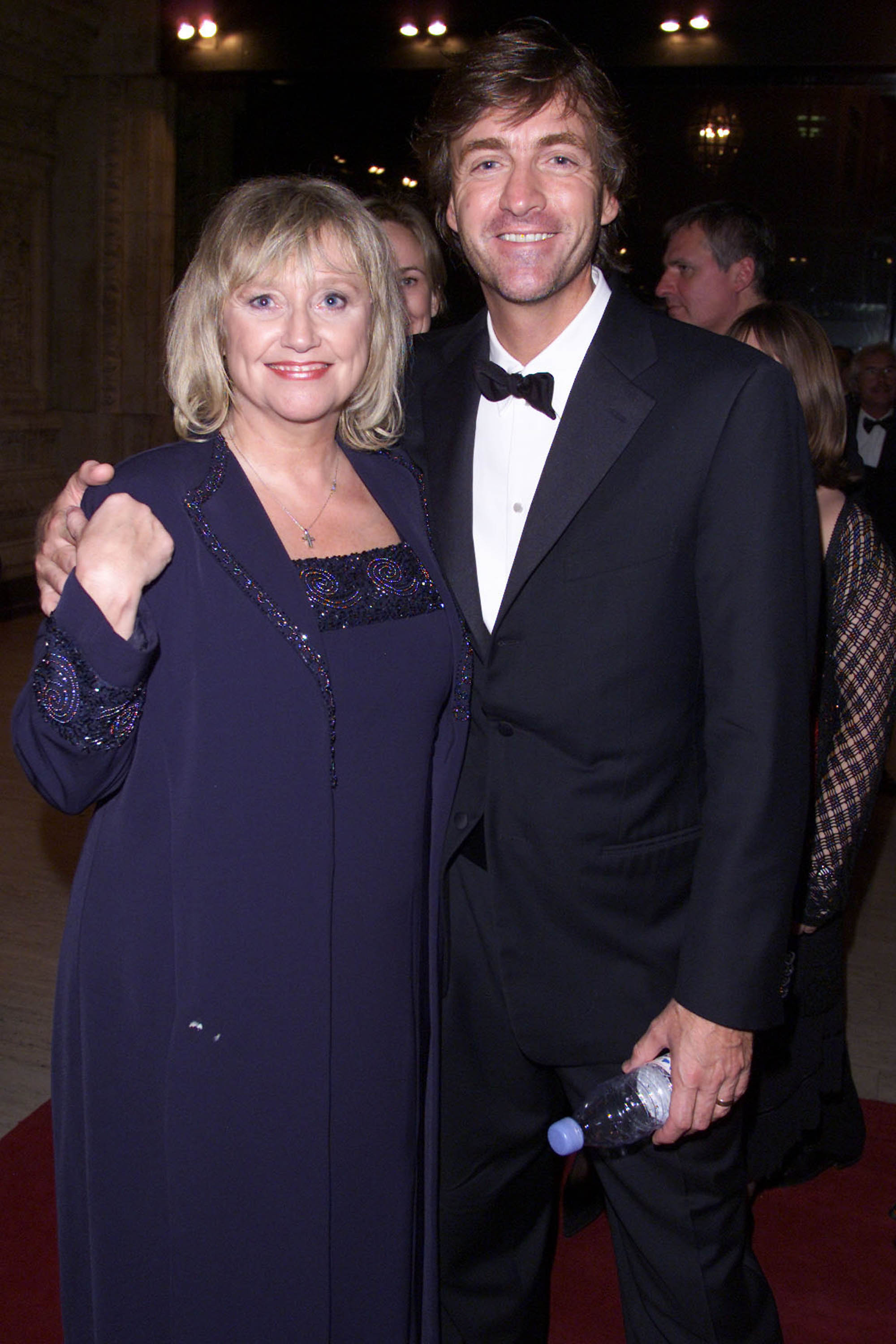 Judy Finnigan and Richard Madeley pose together at the Royal Television Awards at London's Royal Albert Hall on 23 October 2001, moments after winning "Most Popular Daytime Programme" for "This Morning," their smiles capturing a career high point that reflected years of connection with viewers and enduring success on daytime television.