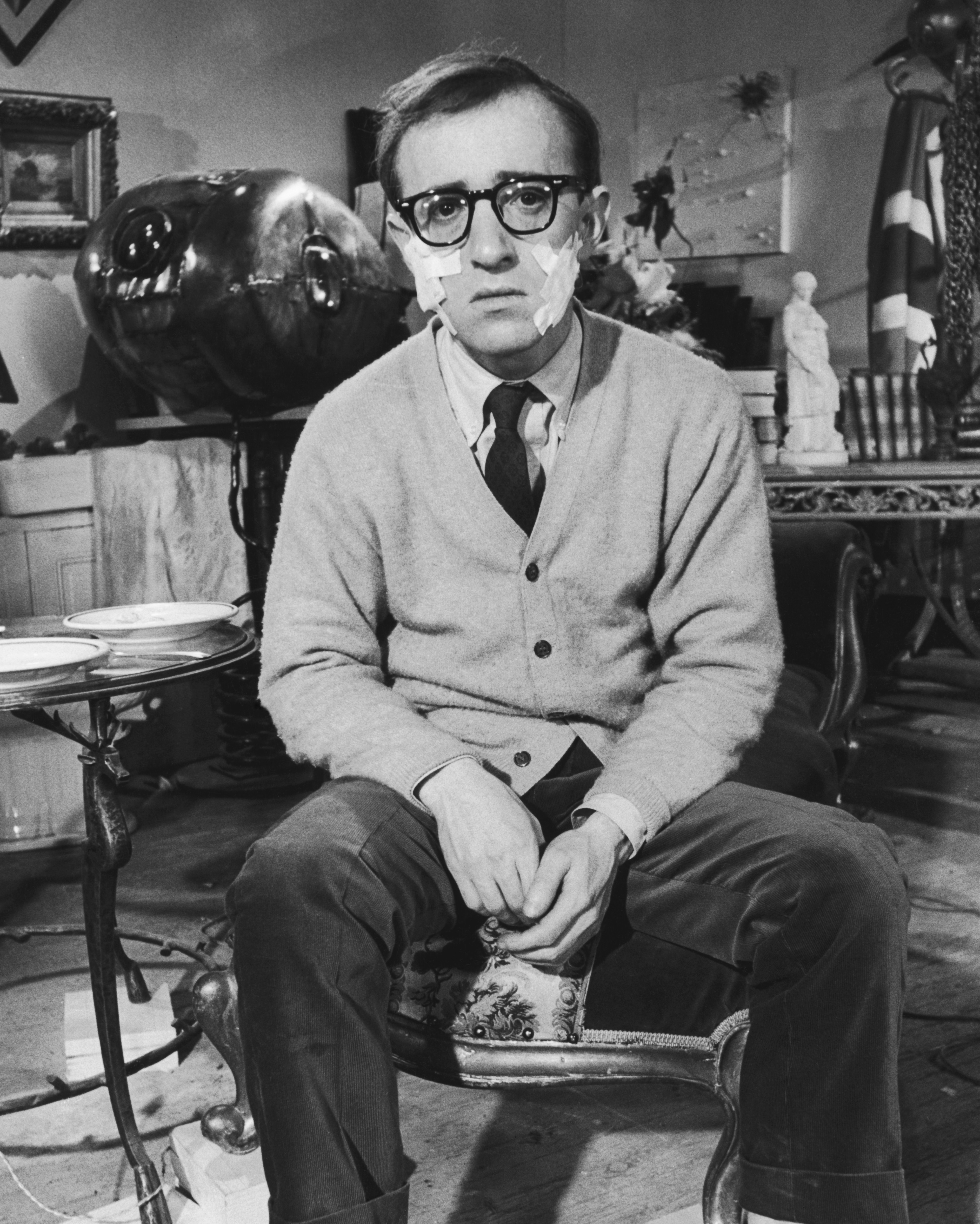 Woody Allen with surgical dressings on each cheek the during filming of "What's New, Pussycat" on January 1, 1965, in Paris, France. | Source: Getty Images