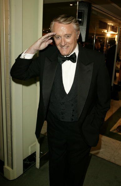 Actor Robert Vaughn arrives at the "TV Quick Awards 2004 " at The Dorchester on September 6, 2004, in London. | Source: Getty Images.