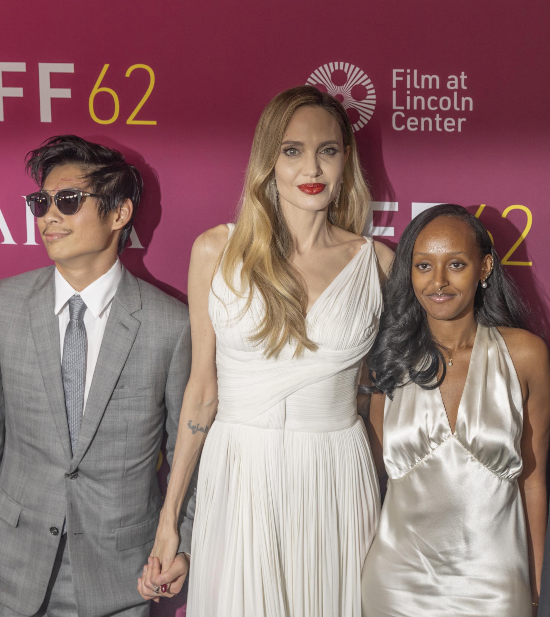 Angelina Jolie with her children, Pax and Zahara, at the "Maria" premiere in New York City on September 29, 2024 | Source: Getty Images