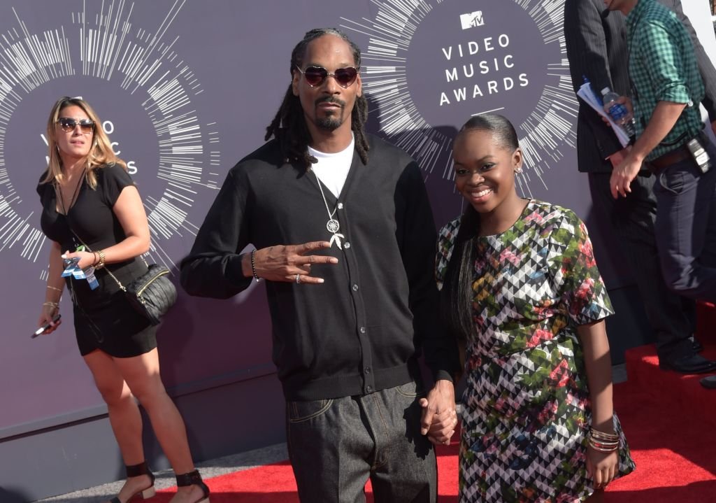 Cori Broadus and Snoop Dogg arrive at the 2014 MTV Video Music Awards at The Forum on August 24, 2014 | Photo: Getty Images