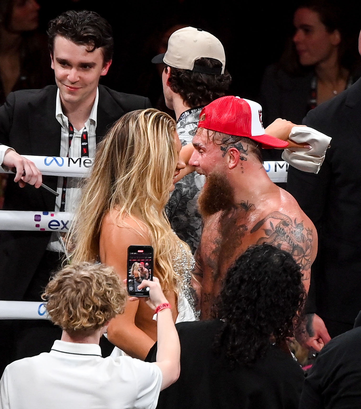 Jutta Leerdam and Jake Paul celebrate after his victory over Mike Tyson following their heavyweight bout fight at AT&T Stadium in Arlington, Texas, on November 15, 2024 | Source: Getty Images