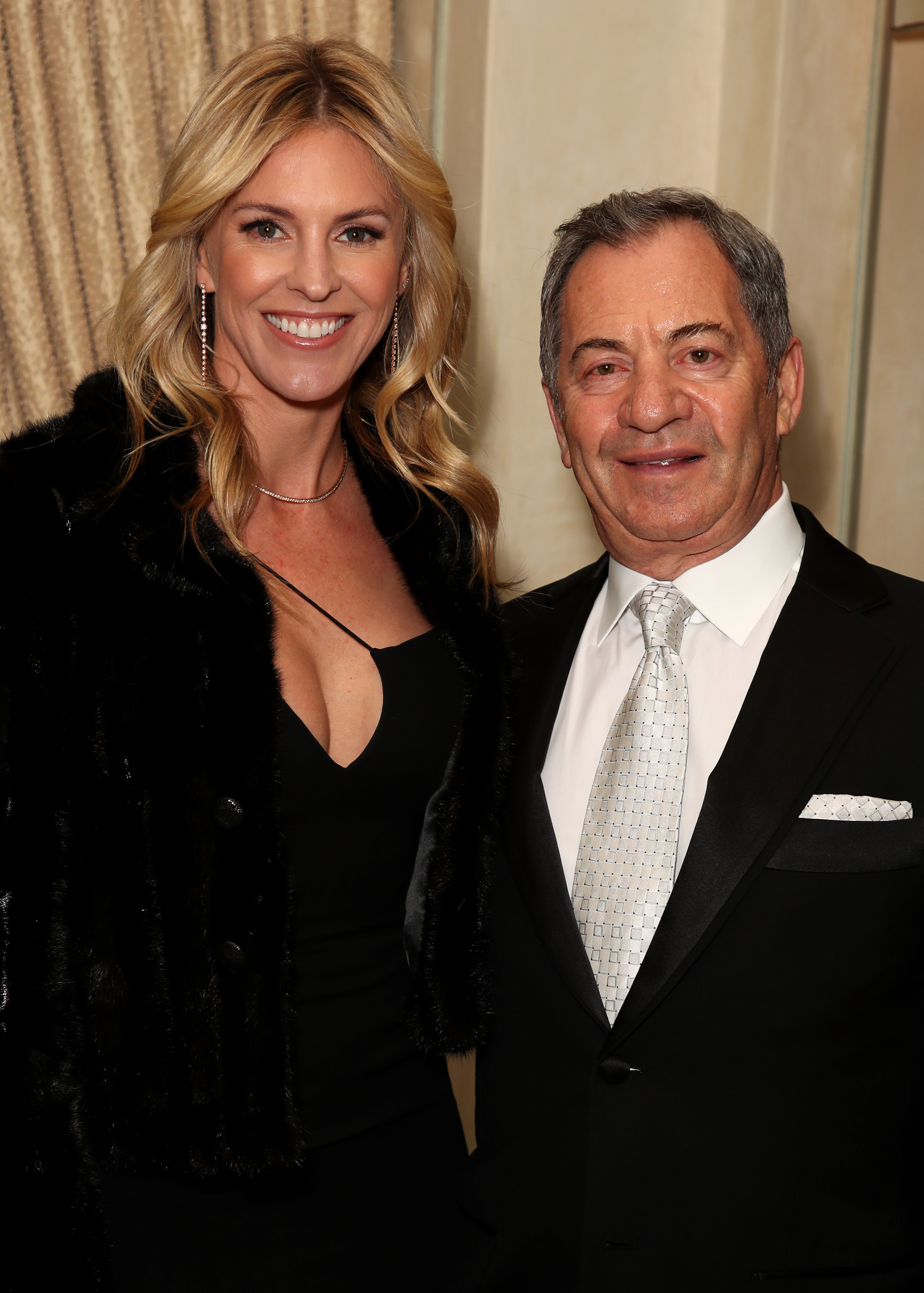 Kelly Noonan and Alec Gores dressed to impress at The Winter Gala in Los Angeles, with the author in a plunging black dress and fur jacket, and her ex looking polished in a sharp tux and silver tie. The couple shared a warm smile at the elegant evening affair.