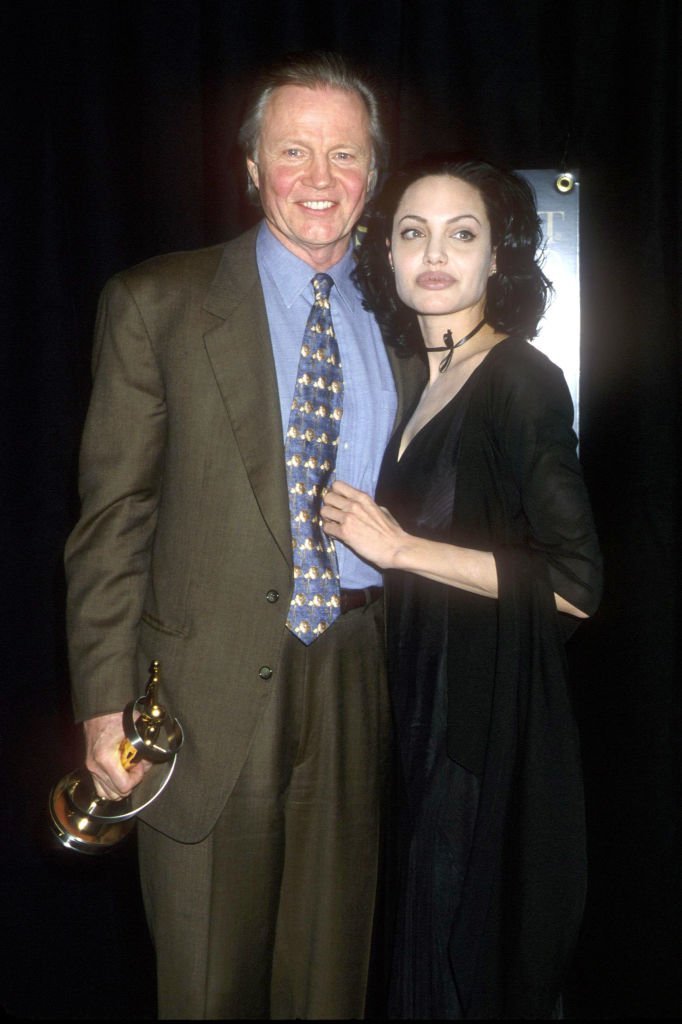 Angelina Jolie with her father Jon Voight at the Vanity Fair Oscar party | Getty Images