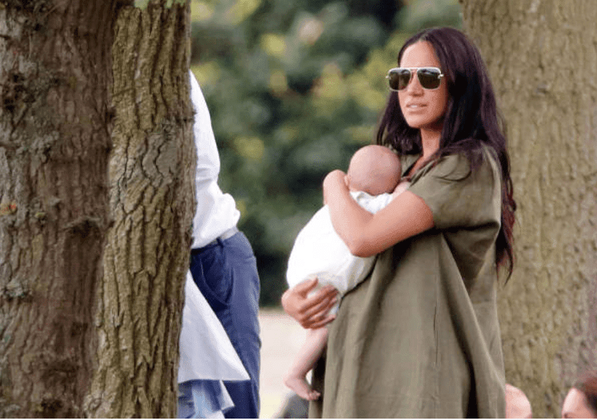 Meghan Markle and Archie Harrison Mountbatten-Windsor watching Prince Harry and Prince William compete at the King Power Royal Charity Polo Match, on July 10, 2019, Wokingham, England | Source: Getty Images