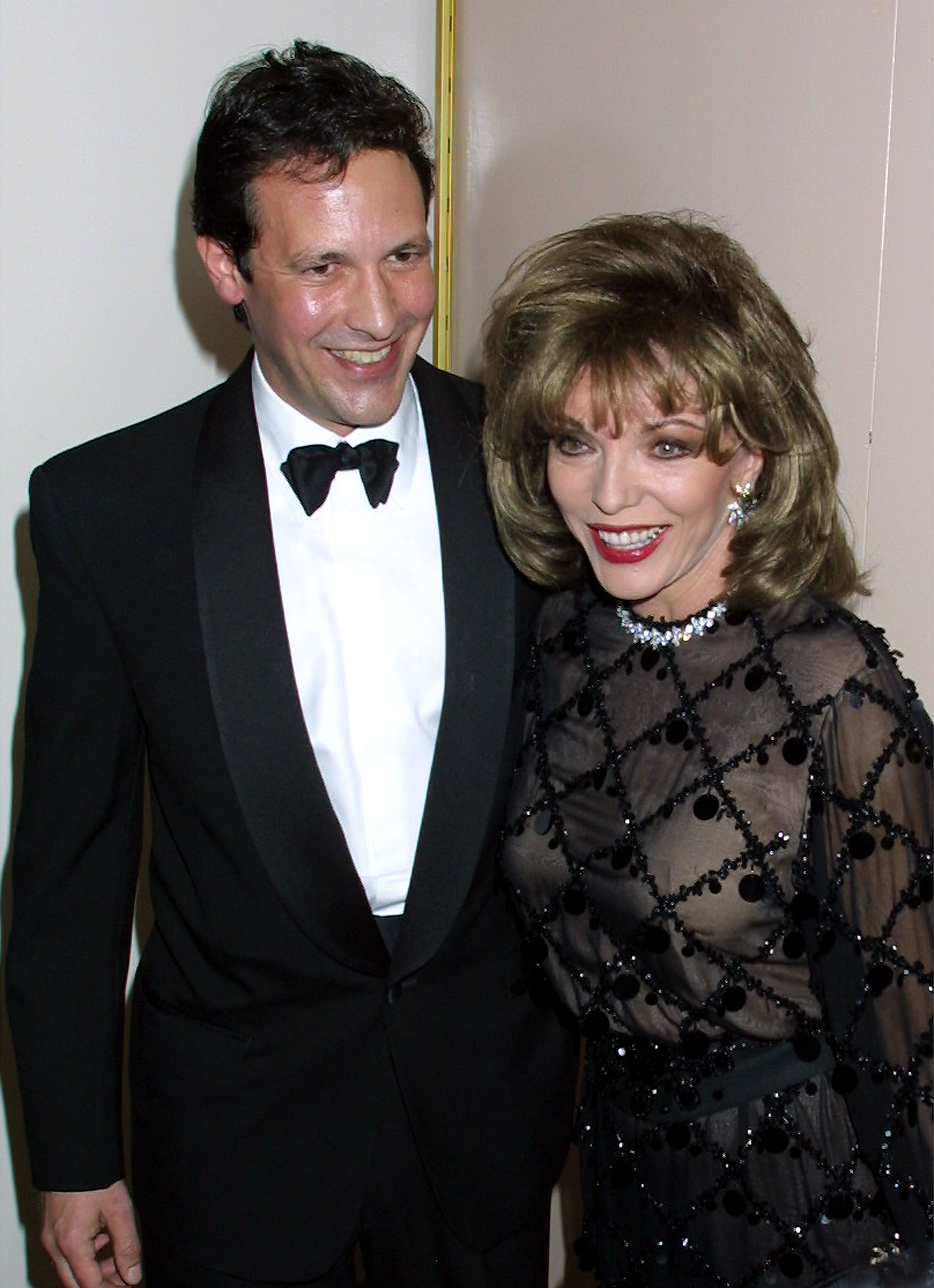 Joan Collins and her boyfriend Percy Gibson at the 12th Annual GLAAD Media Awards on April 16, 2001, in New York City | Source: Getty Images