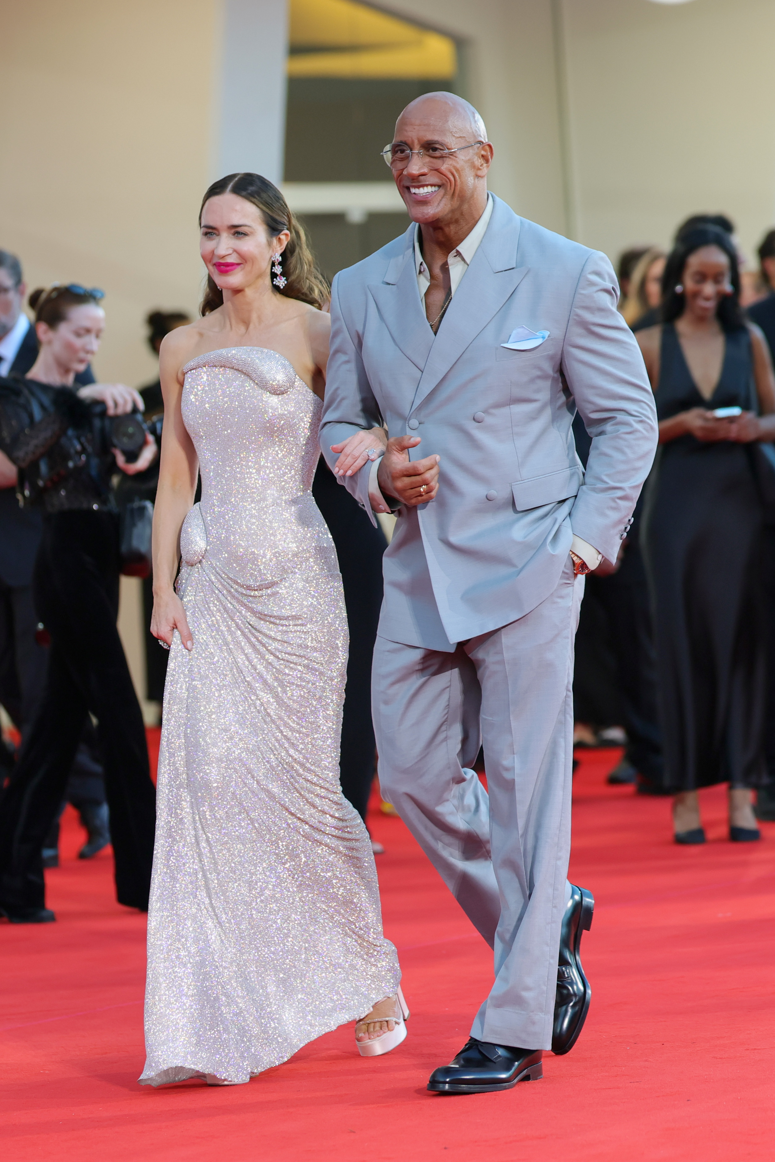 Emily Blunt and Dwayne Johnson attend "The Smashing Machine" red carpet on September 1, 2025. | Source: Getty Images