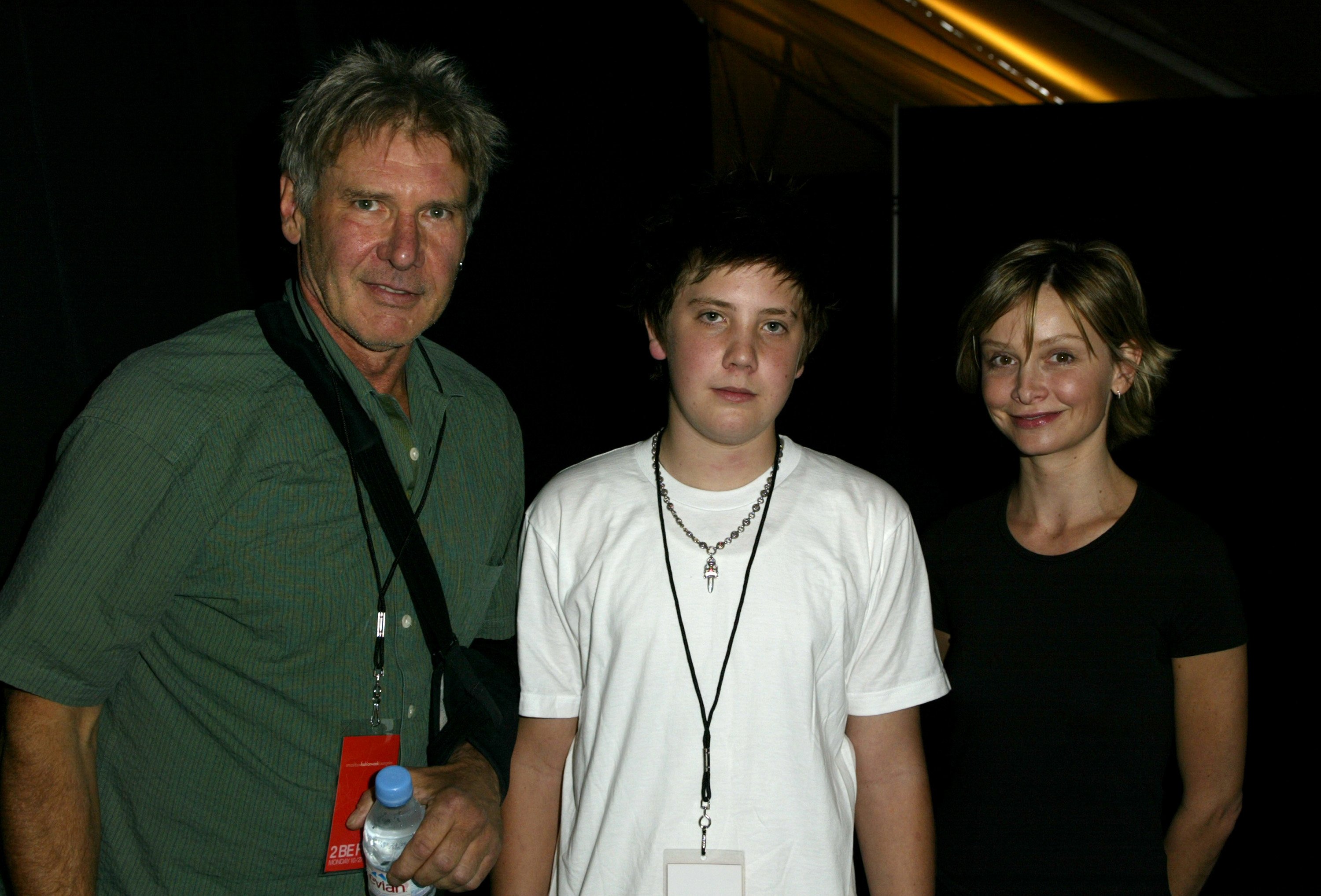 Harrison Ford, son Malcolm Ford and Calista Flockhart at the 2003 Smashbox Fashion Week Los Angeles - 2B Free Spring Collection 2004 - Backstage on October 27, 2003 ┃Source: Getty Images