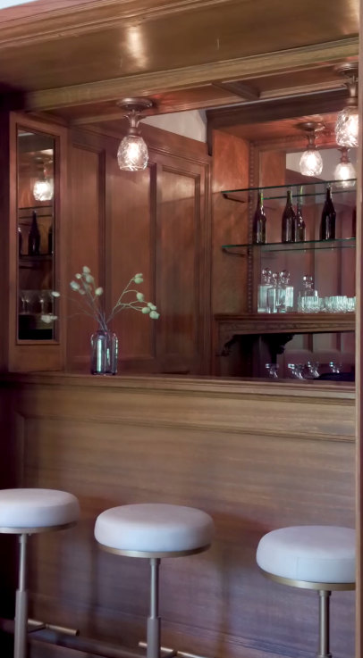 There's also an abundance of light even in areas with wood paneling, like this bar area. | Source: Instagram/weahomes