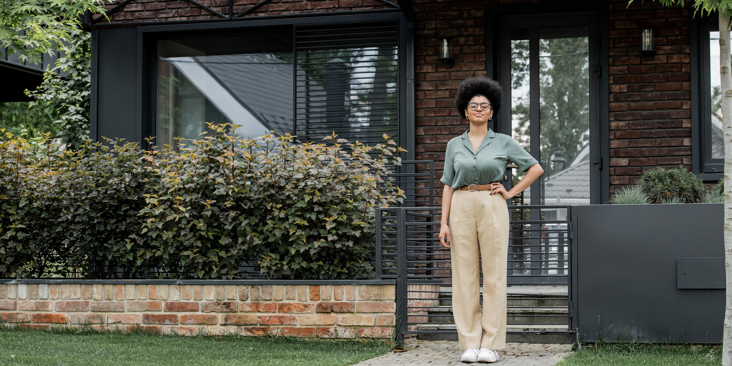 A woman on the porch of the house | Source: Shutterstock