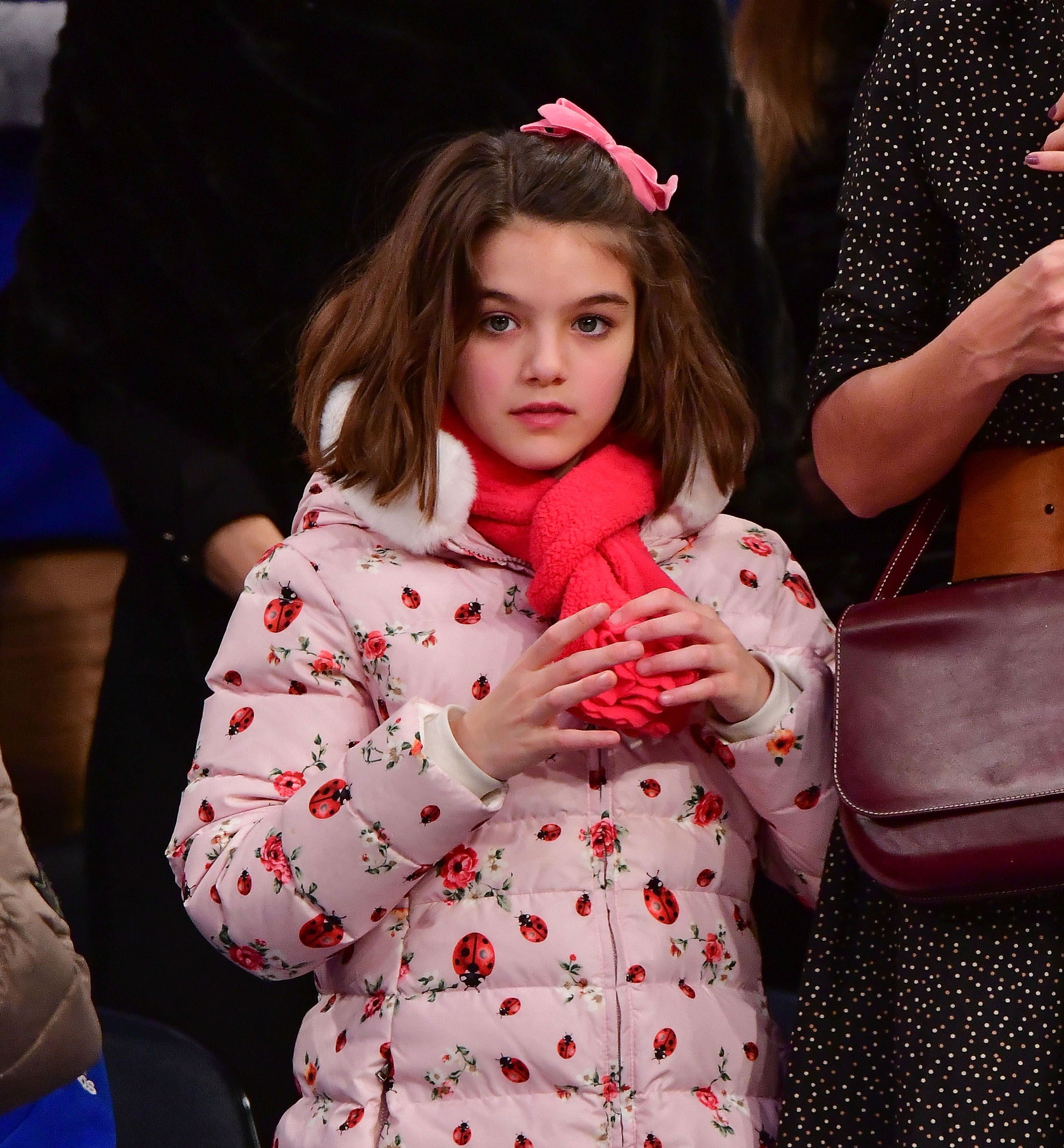 Suri Cruise watches the Oklahoma City Thunder take on the New York Knicks at Madison Square Garden. | Source: Getty Images