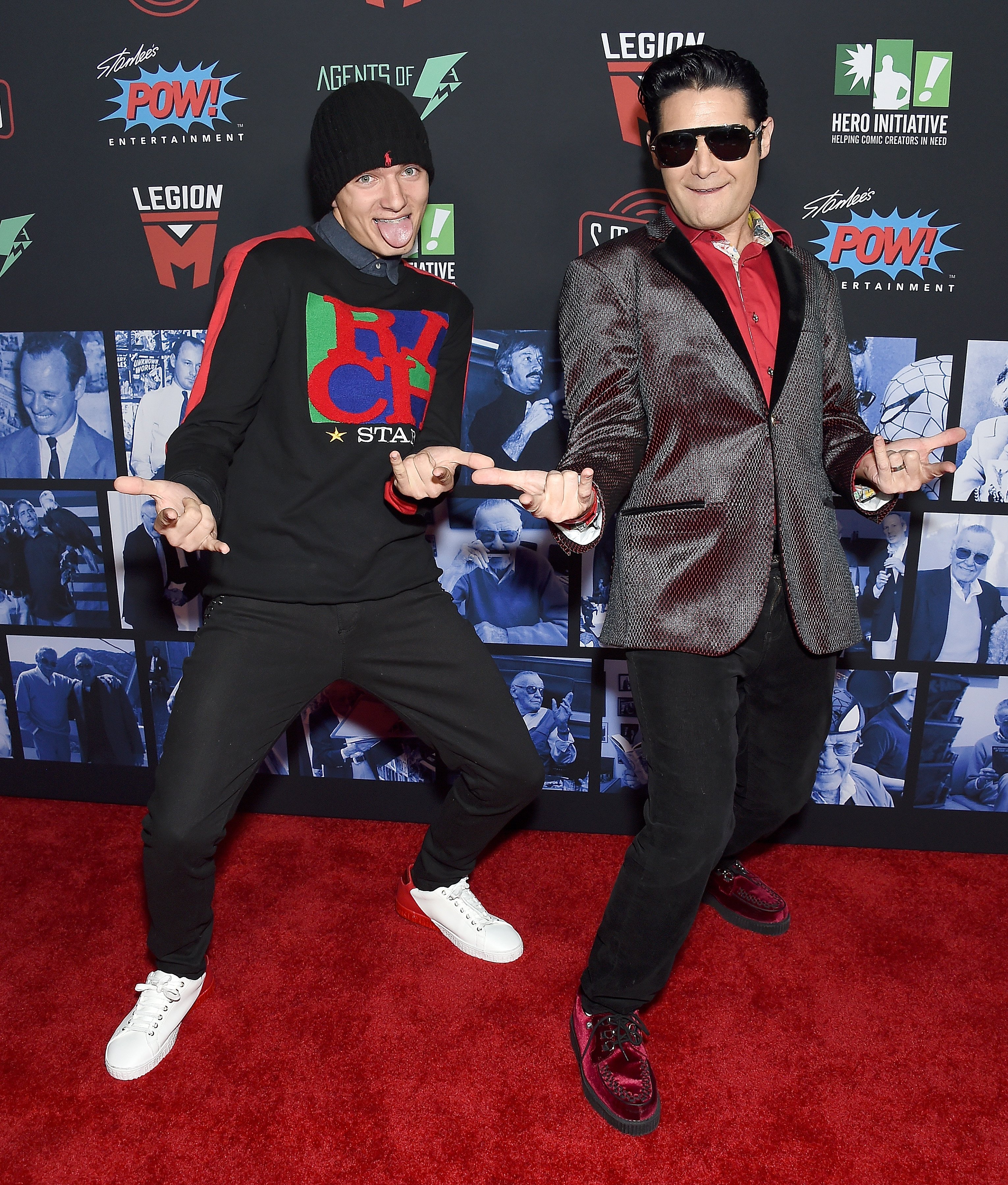 Corey Feldman and Zen Scott Feldman pose on the red carpet at Excelsior! A Celebration Of The Amazing, Fantastic, Incredible And Uncanny Life Of Stan Lee at TCL Chinese Theatre on January 30, 2019, in Hollywood, California | Source: Getty Images