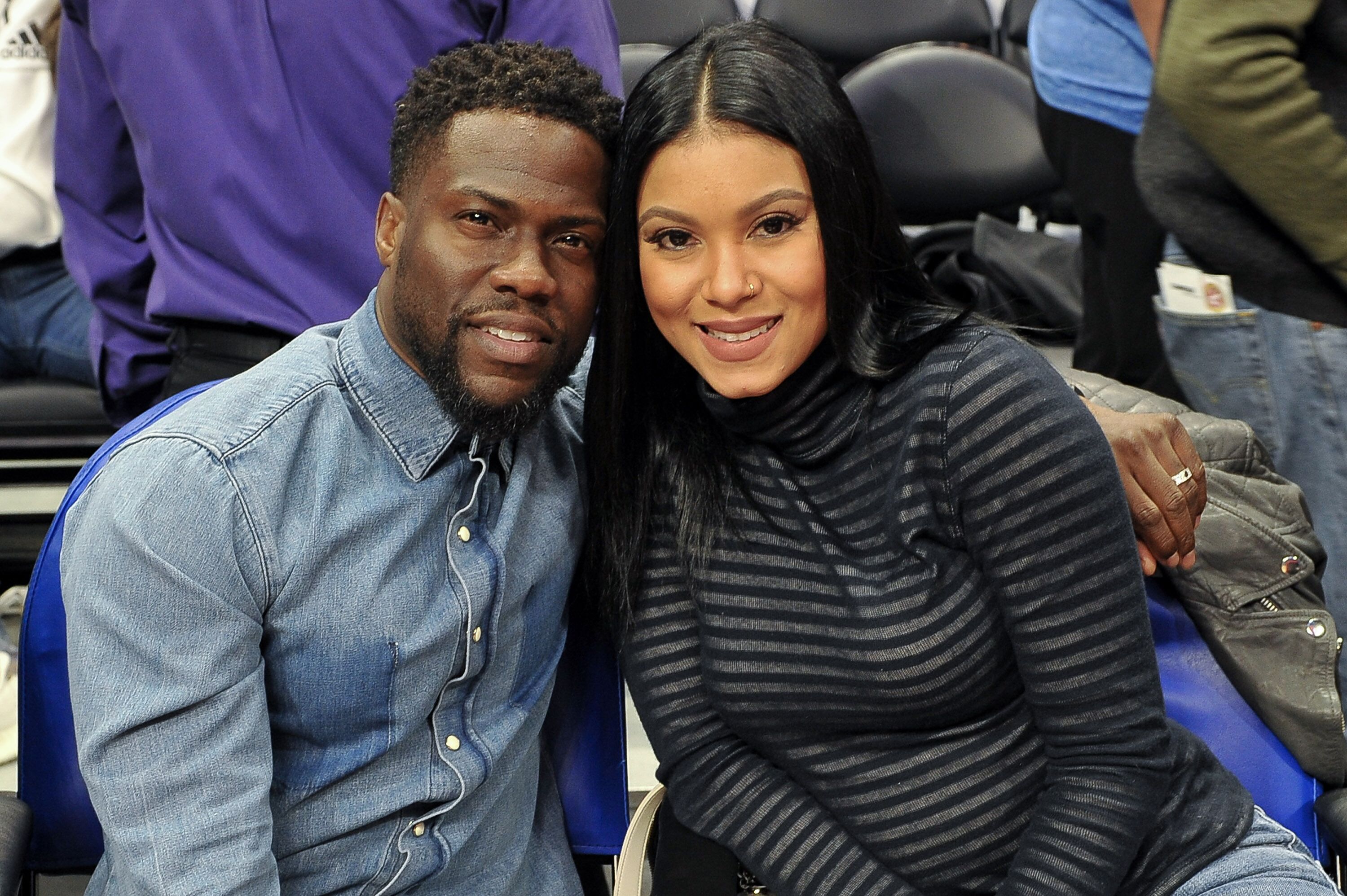 Kevin Hart and Eniko Parrish at a basketball game at Staples Center on January 22, 2018 in Los Angeles, California | Photo: Getty Images 