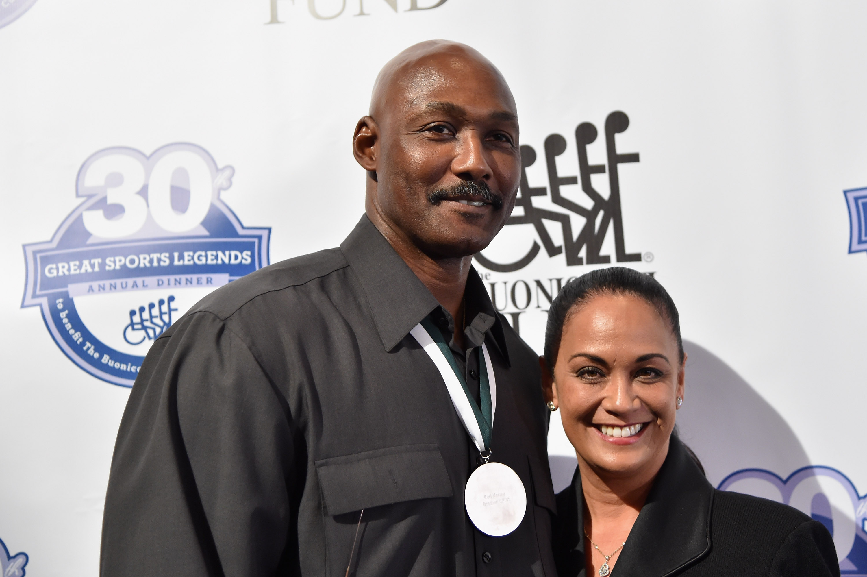 Karl Malone and his wife Kay Kinsey Malone at the 30th Annual Great Sports Legends Dinner on October 6, 2015, in New York City | Source: Getty Images