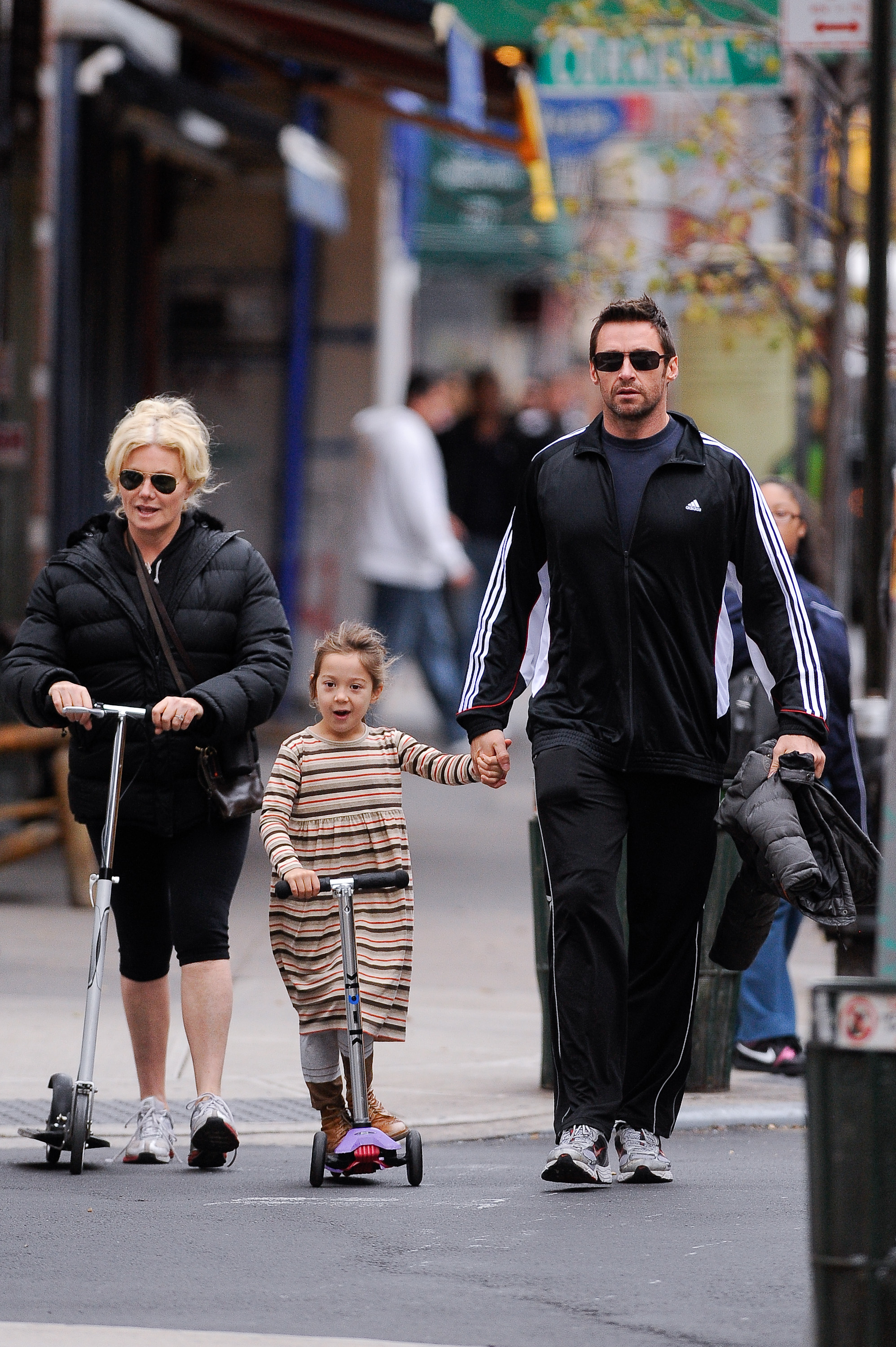Deborra-Lee Furness, Ava, and Hugh Jackman in New York City on October 29, 2010 | Source: Getty Images