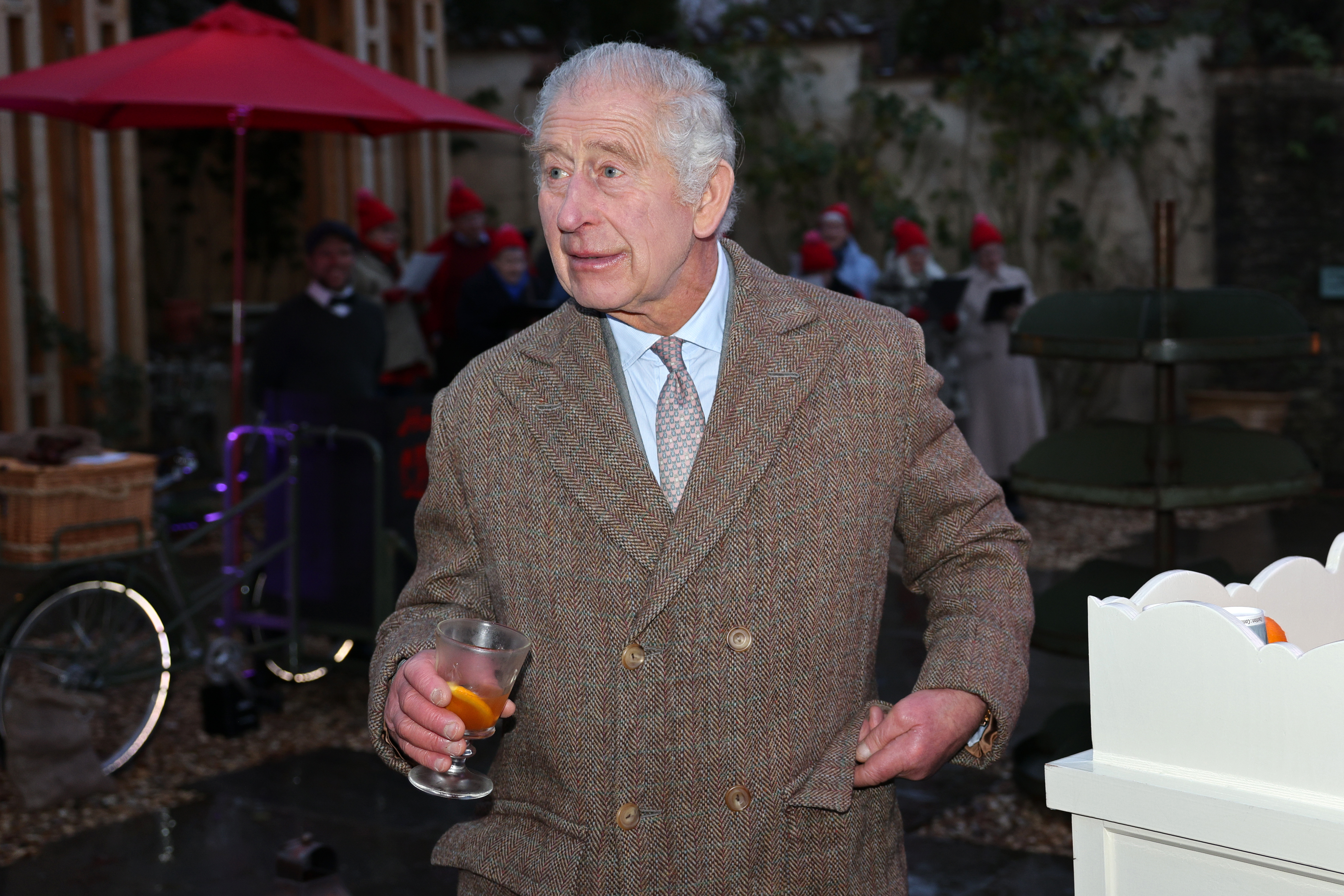 King Charles III attends a festive themed "Celebration of Craft" on December 8, 2023 in Tetbury, England | Source: Getty Images