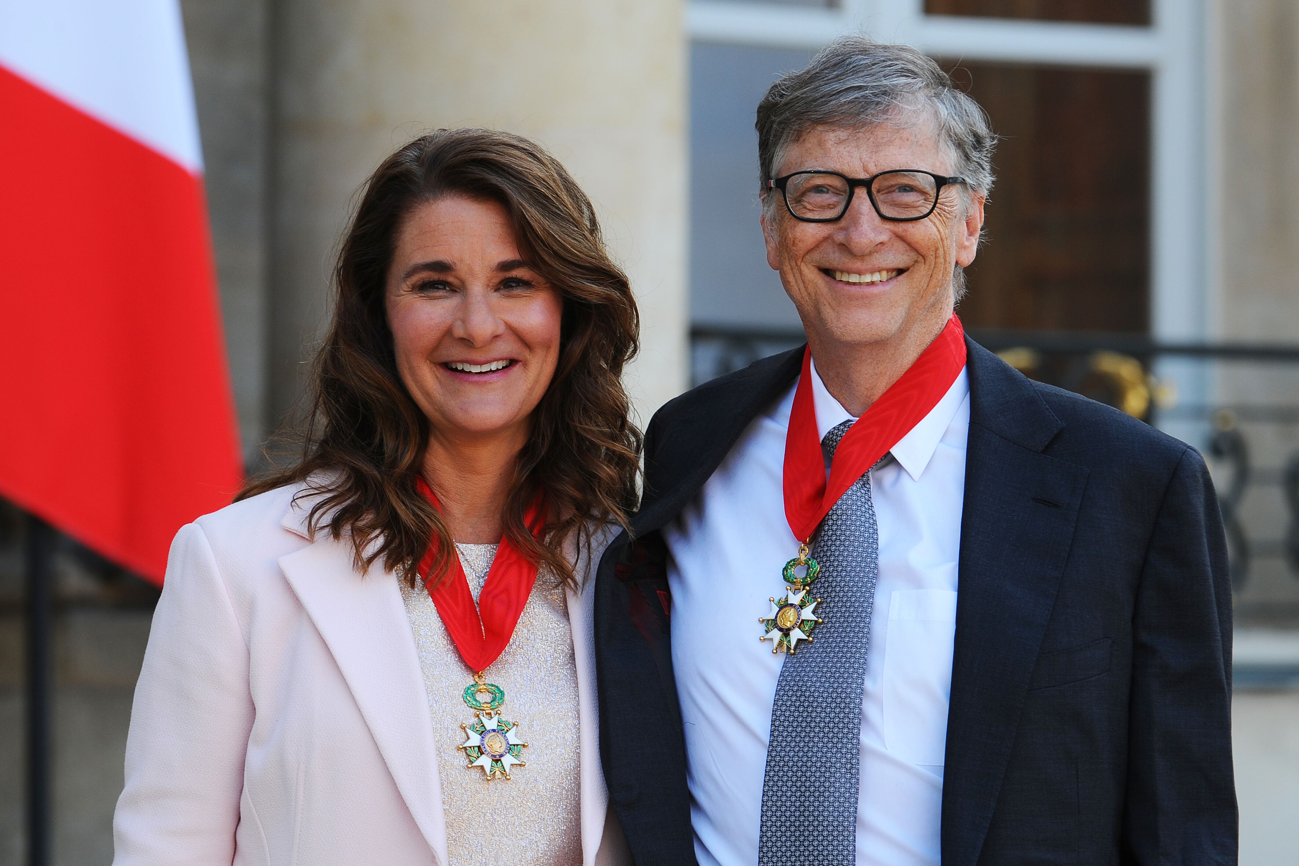Bill and Melinda Gates pose in front of the Elysee Palace after receiving the award of Commander of the Legion of Honor by French President Francois Hollande on April 21, 2017 in Paris, France | Photo: Getty Images