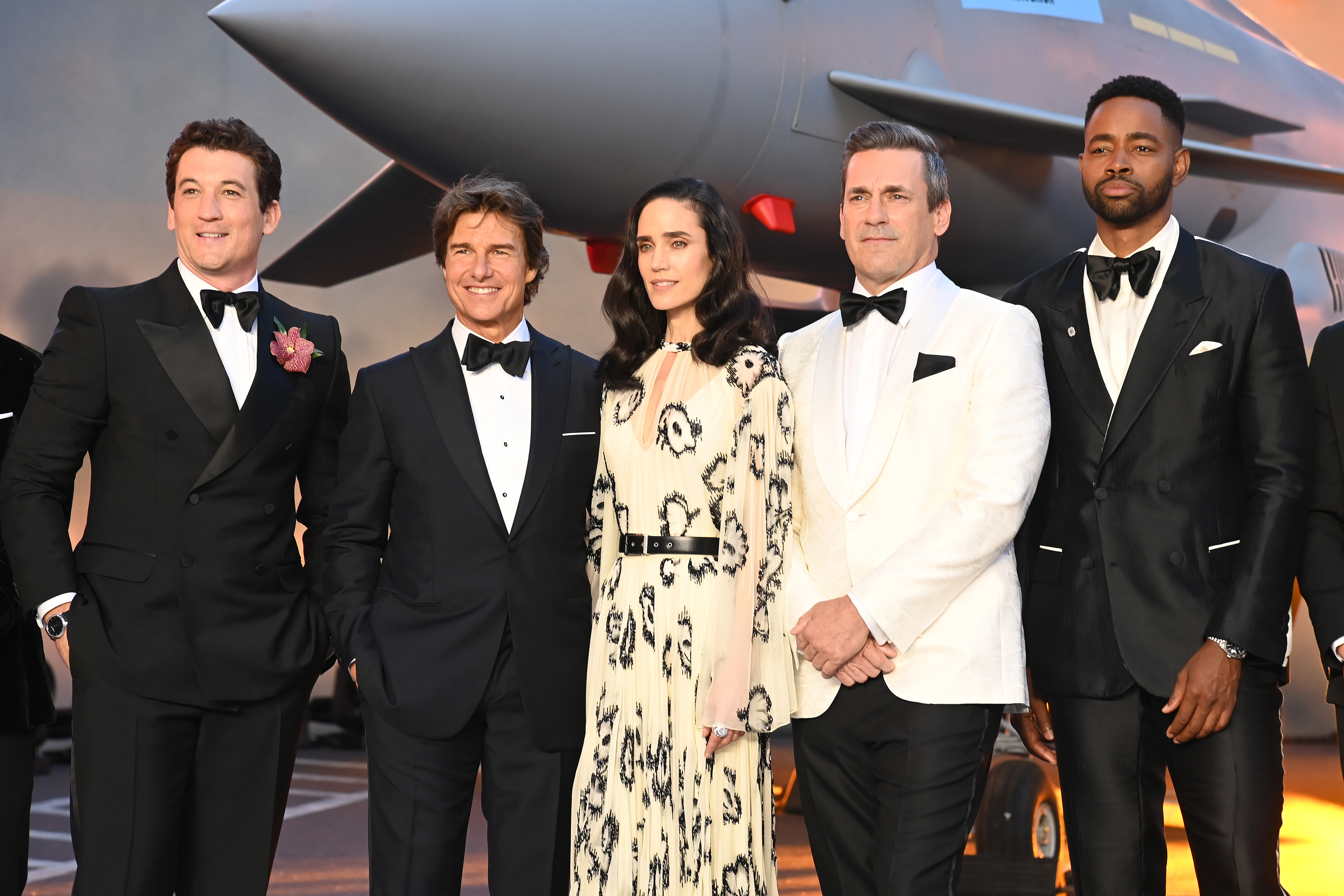 Miles Teller, Tom Cruise, Jennifer Connelly, Jon Hamm, and Jay Ellis at the "Top Gun: Maverick" Royal Film Performance on May 19, 2022, in London, England | Source: Getty Images
