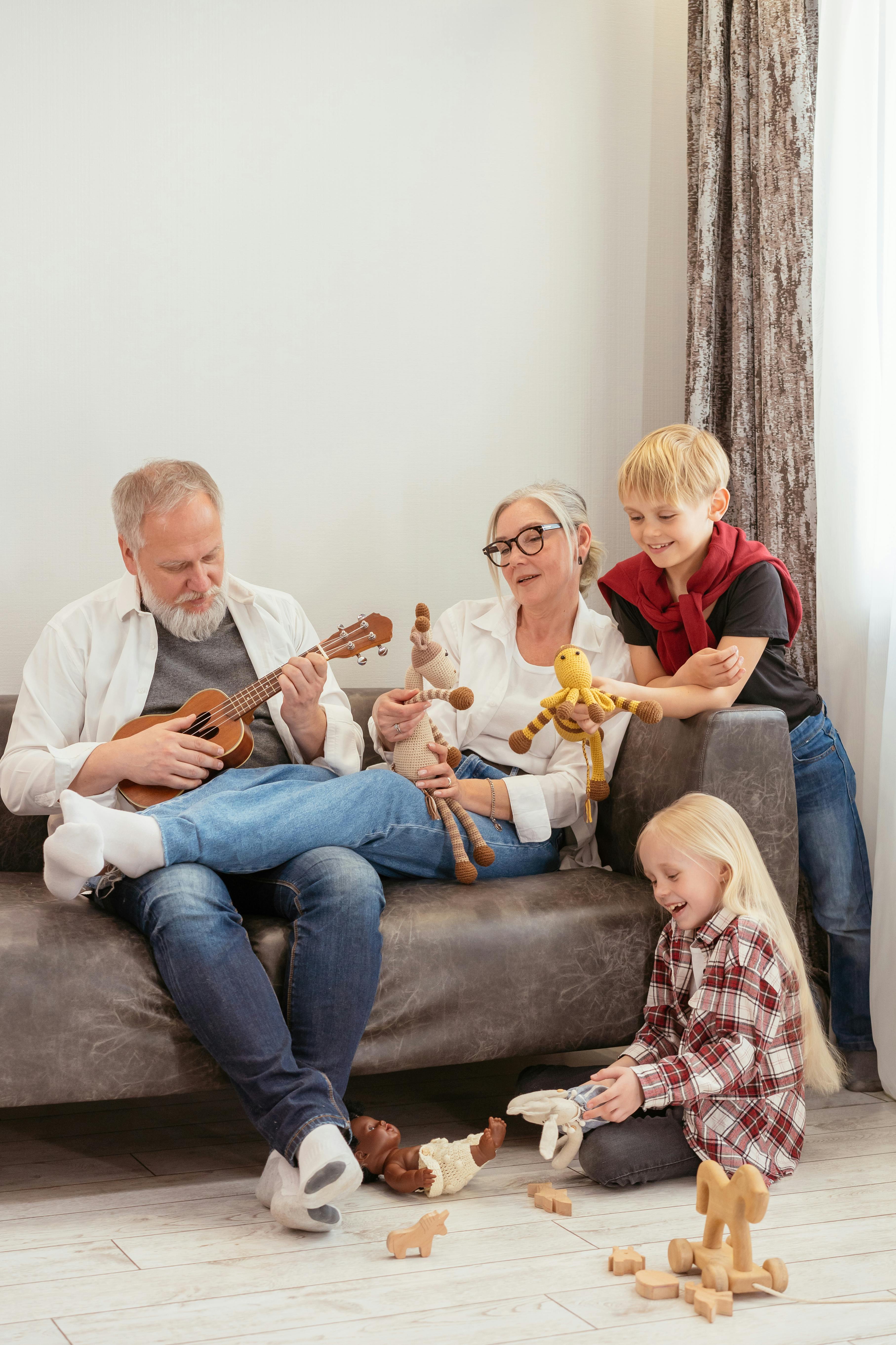 Grandparents and grandchildren playing together | Source: Pexels