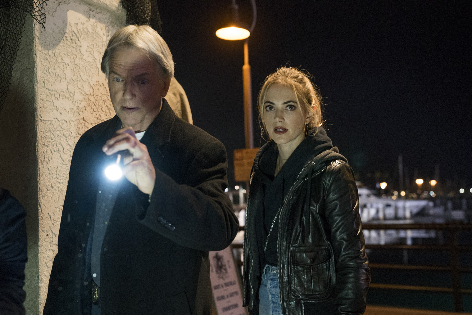 Mark Harmon and Emily Wickersham filming "NCIS" in 2017. | Source: Getty Images