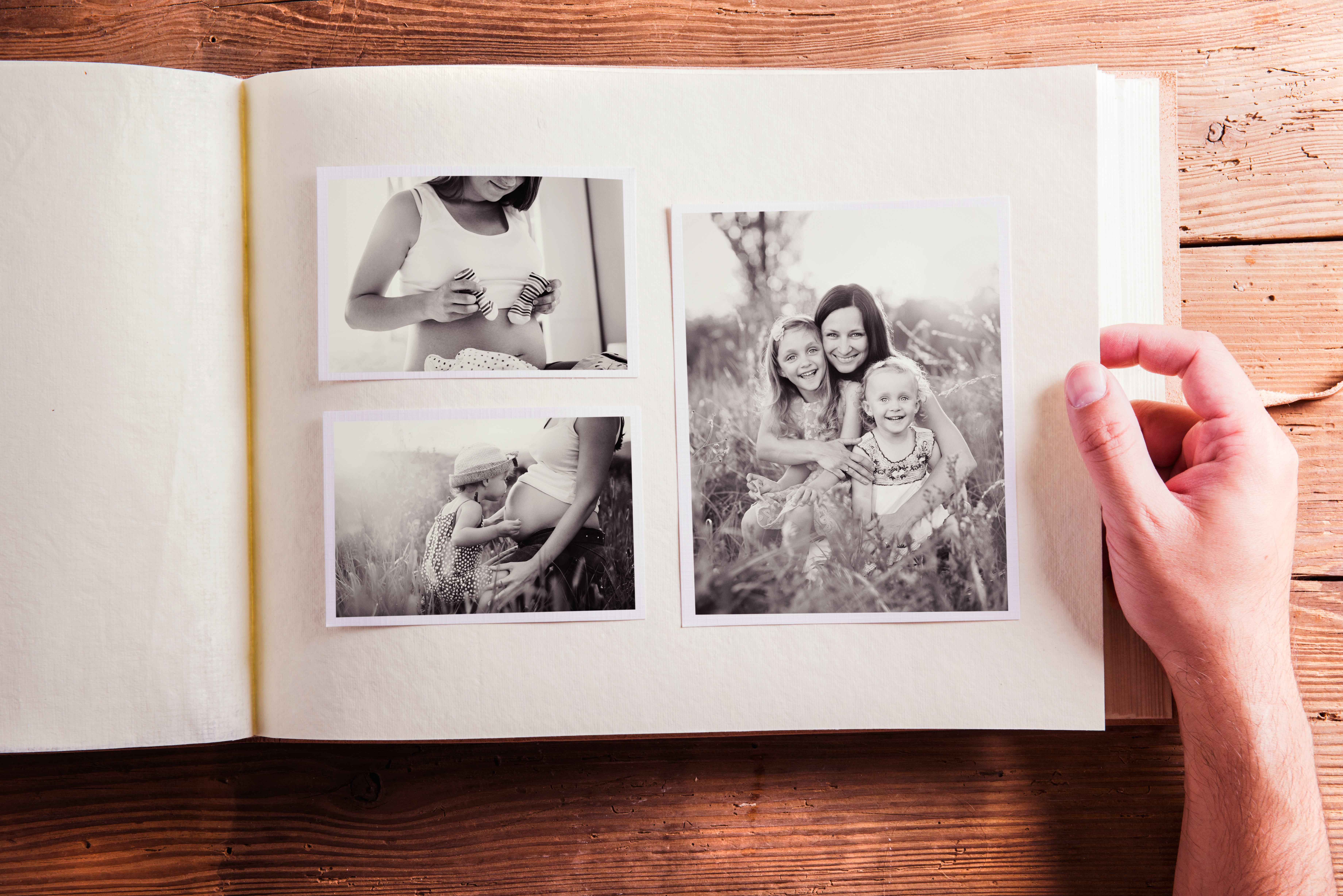 Mothers day composition. Photo album, black-and-white pictures. | Source: Getty Images