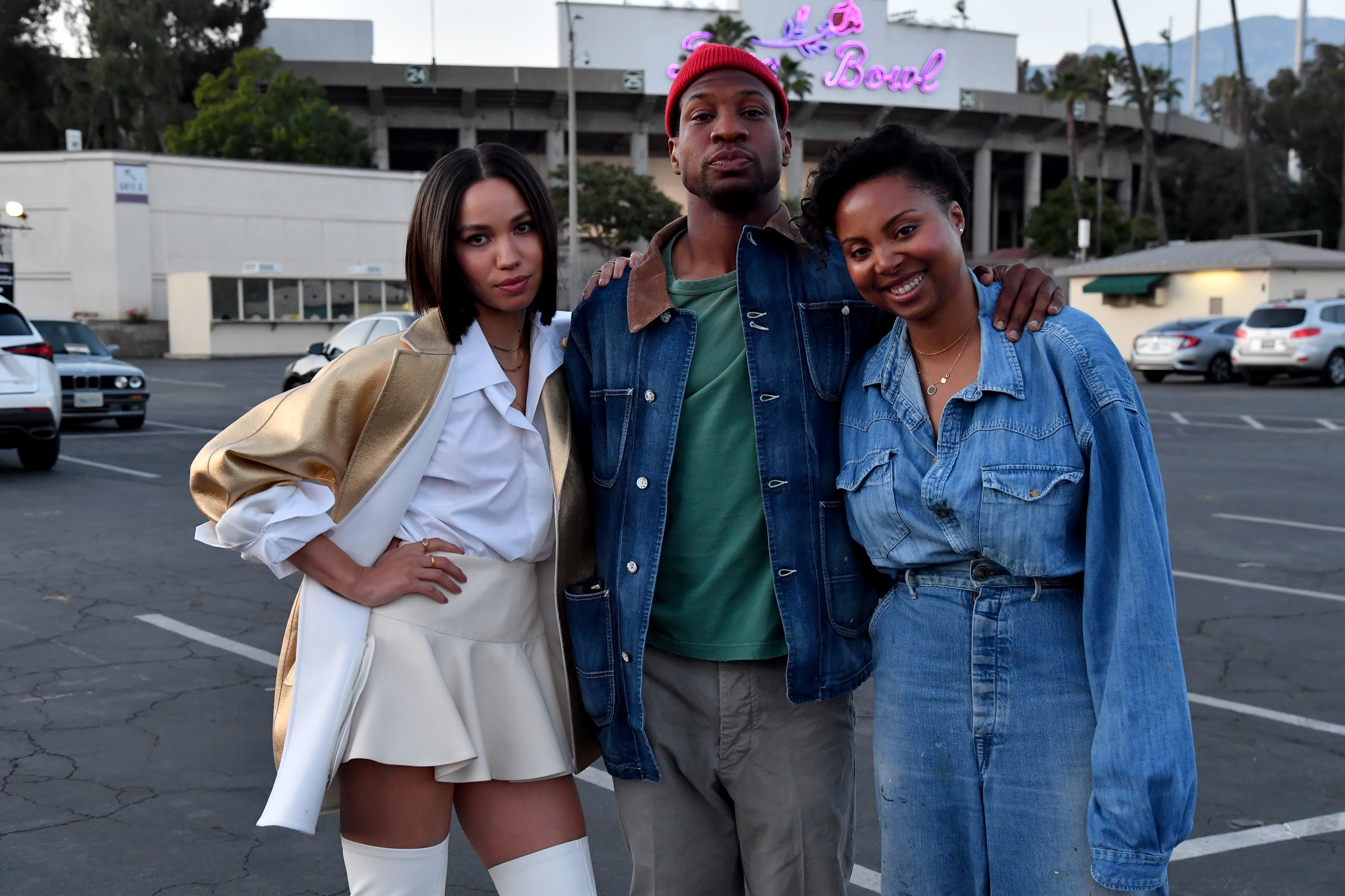 Jurnee Smollett, Jonathan Majors and Misha Green attend the HBO Max FYC Drive-In for "Lovecraft Country" at the Rose Bowl, on May 18, 2021, in Pasadena, California. | Source: Getty Images