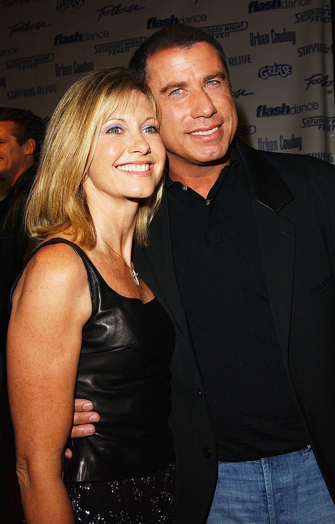  Olivia Newton-John and actor John Travolta from the movie "Grease" attend the Celebration of Paramount Studio's 90th Anniversary with the release of six all-time musical favorites | Getty Images