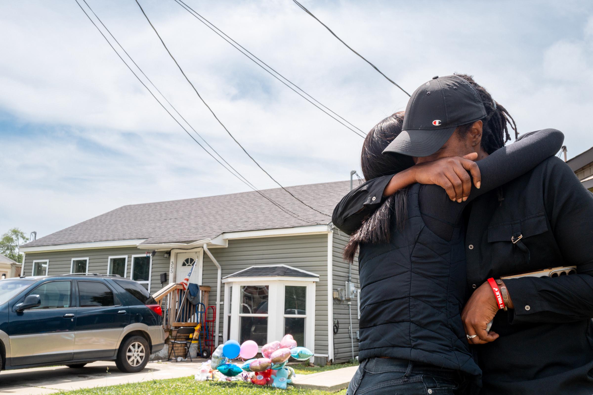 People embrace outside a home on April 20, 2026, a day after the deadly shooting in Shreveport, Louisiana | Source: Getty Images