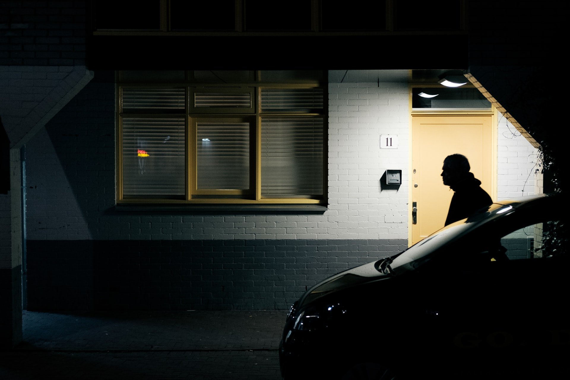 A man walking in the dark | Source: Unsplash