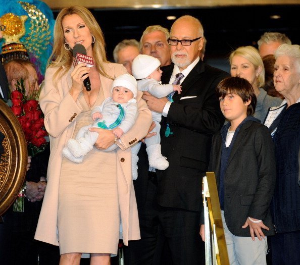 inger Celine Dion, holding her son Nelson Angelil, her husband and manager Rene Angelil, holding their son Eddy Angelil, and their son Rene-Charles Angelil are greeted as they arrive at Caesars Palace February 16, 2011 in Las Vegas, Nevada | Photo: Getty Images