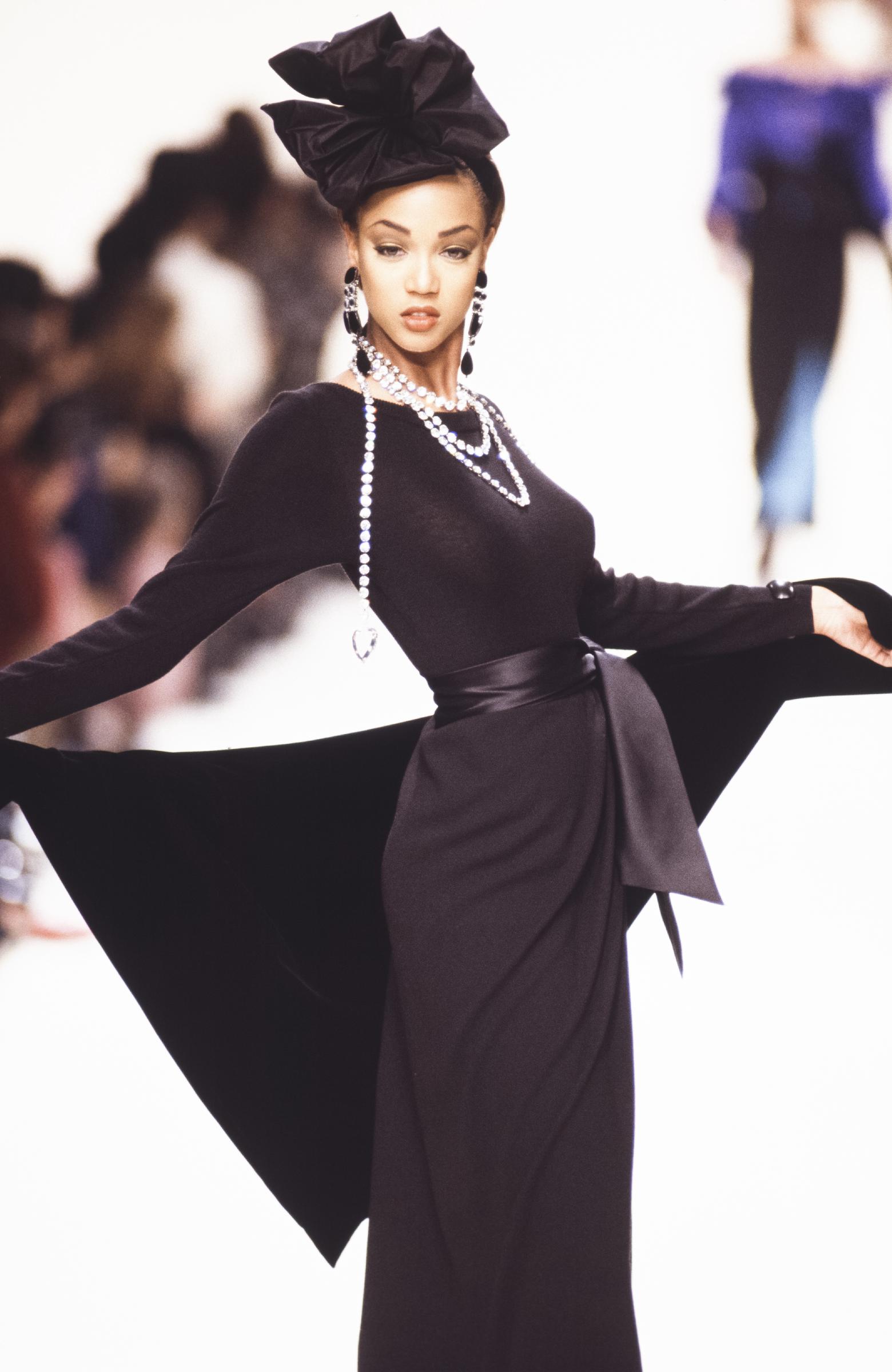 Tyra Banks walks in the Yves Saint Laurent Ready-to-Wear Fall/Winter 1992-1993 fashion show during Paris Fashion Week in March 1992 | Source: Getty Images