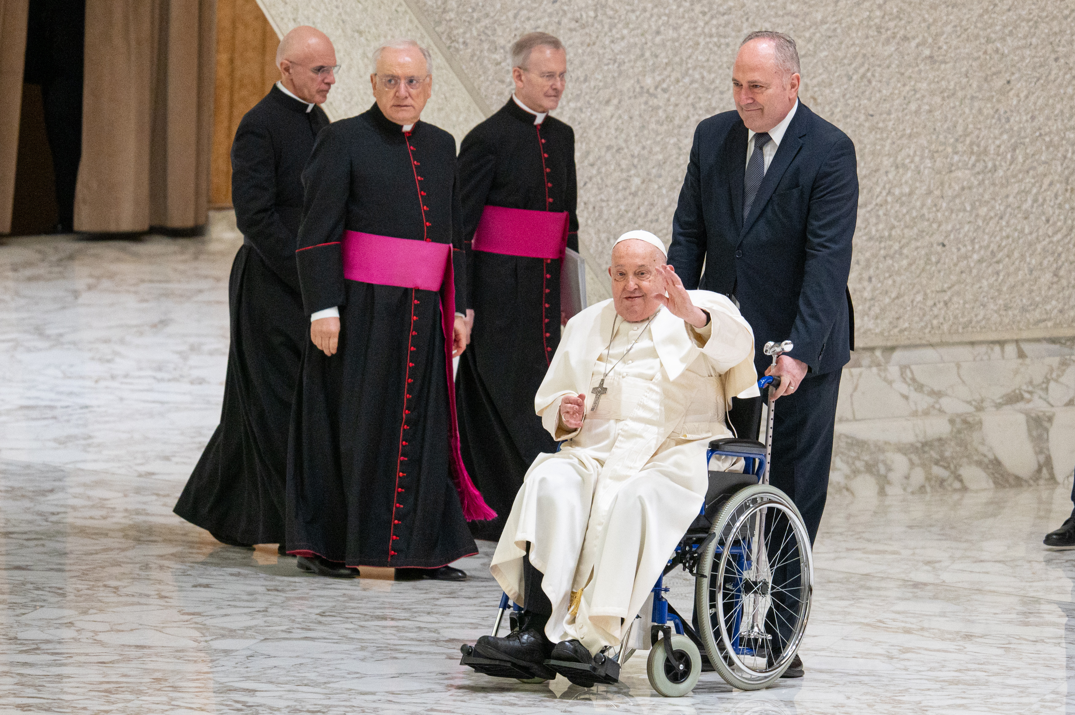 Pope Francis smiling and waving during the weekly general audience. | Source: Getty Images