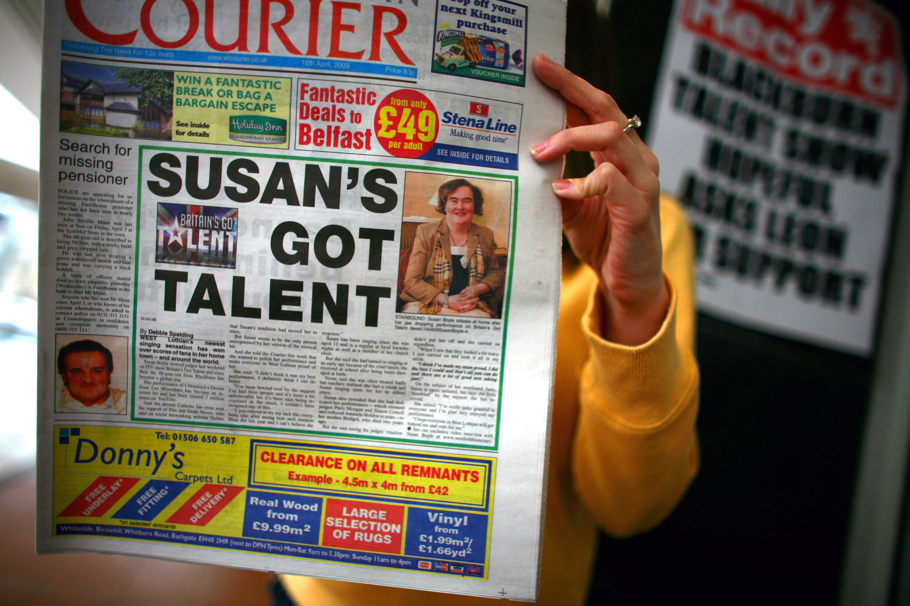 Locals in the town of Blackburn West Lothian show there support for the "Britain's Got Talent" contestant on April 18, 2009 in Blackburn, Scotland | Source: Getty Images