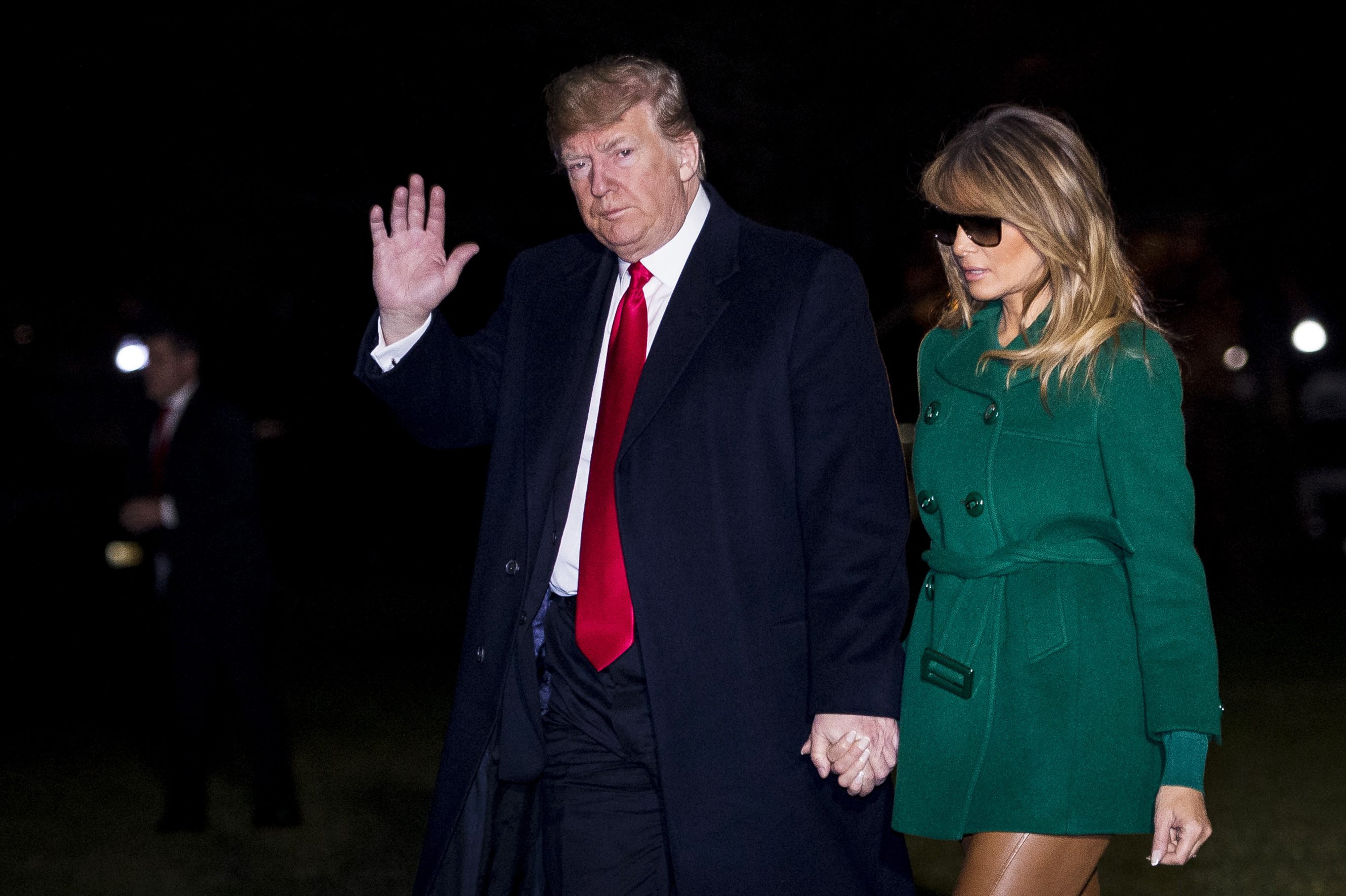 Donald and Melania Trump making their way across the South Lawn of the White House on December 27, 2018, in Washington, D.C. | Source: Getty Images
