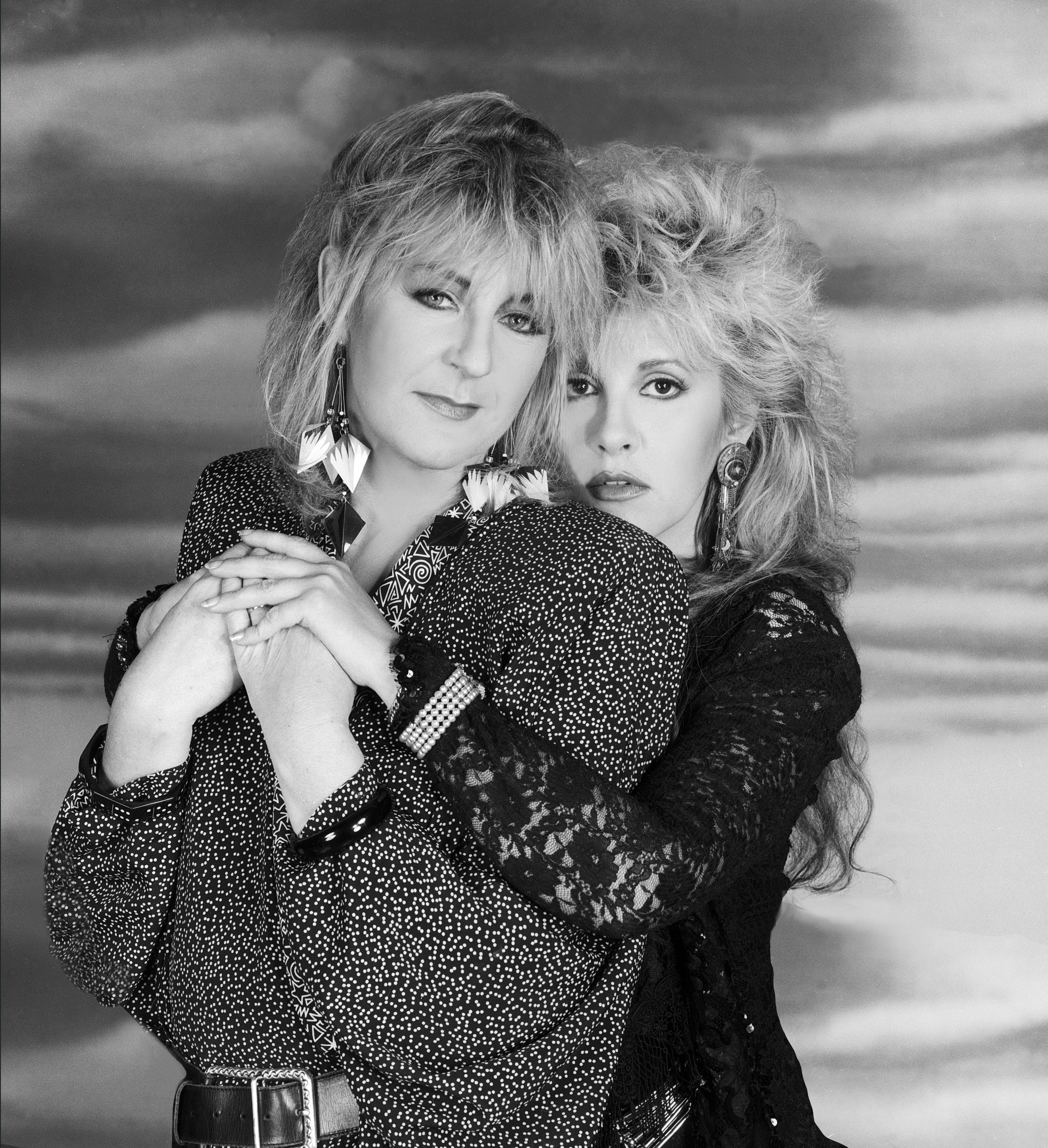 Christine McVie and Stevie Nicks of Fleetwood Mac pose for a portrait circa 1987 in Los Angeles, California | Source: Getty Images 