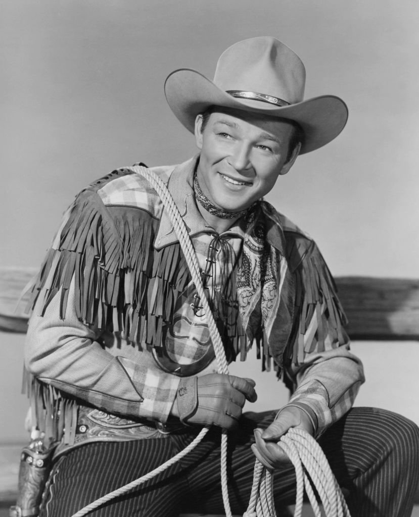 Singer and actor Roy Rogers, 'King of the Cowboys', in his cowboy suit on 'The Roy Rogers Show', USA, circa 1955. | Photo: Getty Images