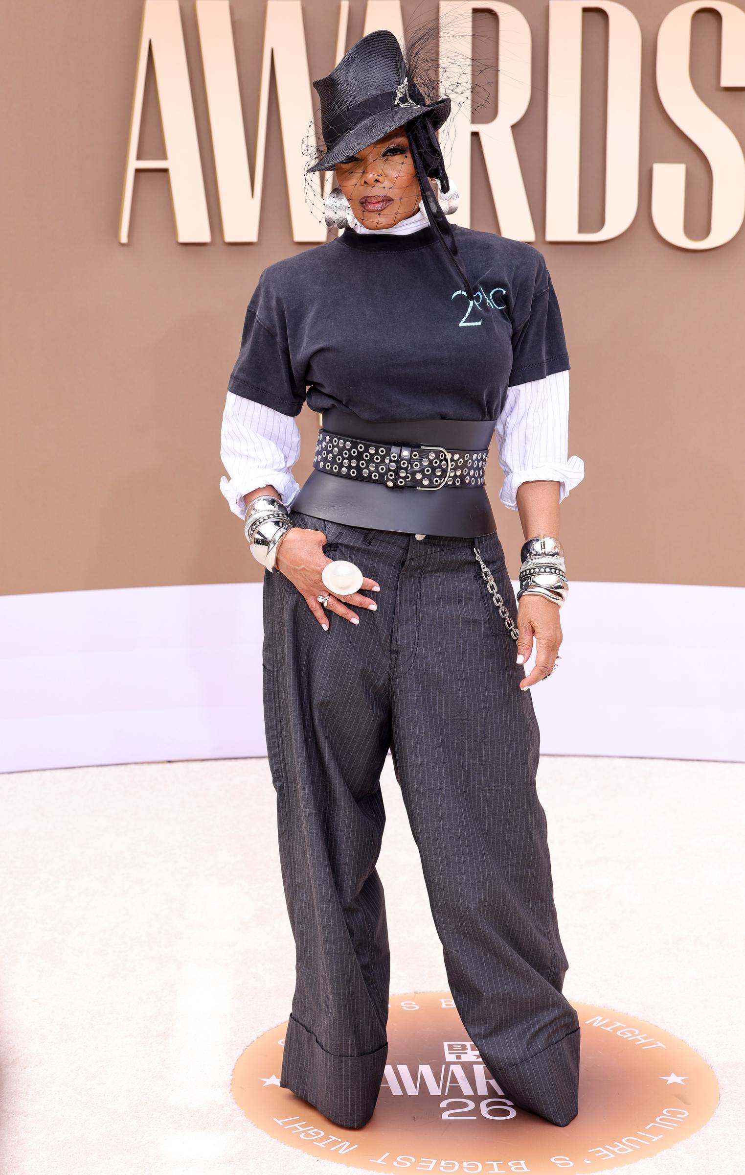 The complete styling of Janet Jackson's BET Awards look is seen on the red carpet before she took the stage to present the Icon of the Year Award. | Source: Getty Images