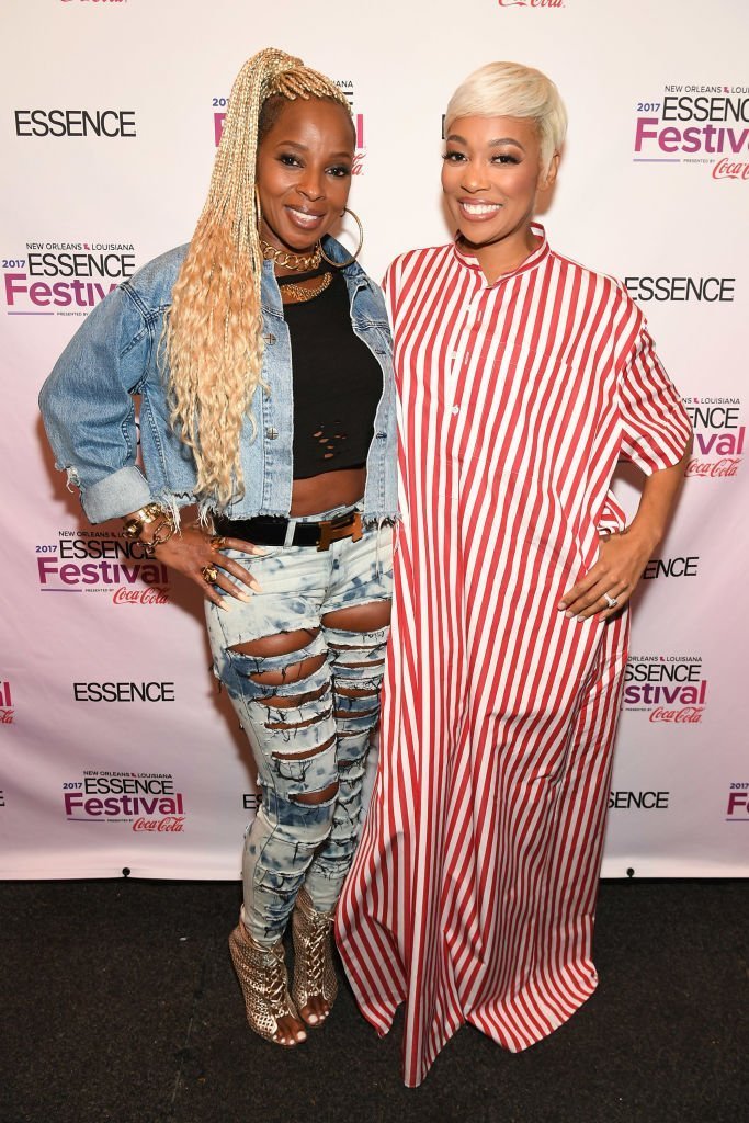 Mary J. Blige and Monica pose backstage at the 2017 ESSENCE Festival presented by Coca-Cola at Ernest N. Morial Convention Center | Photo: Getty Images