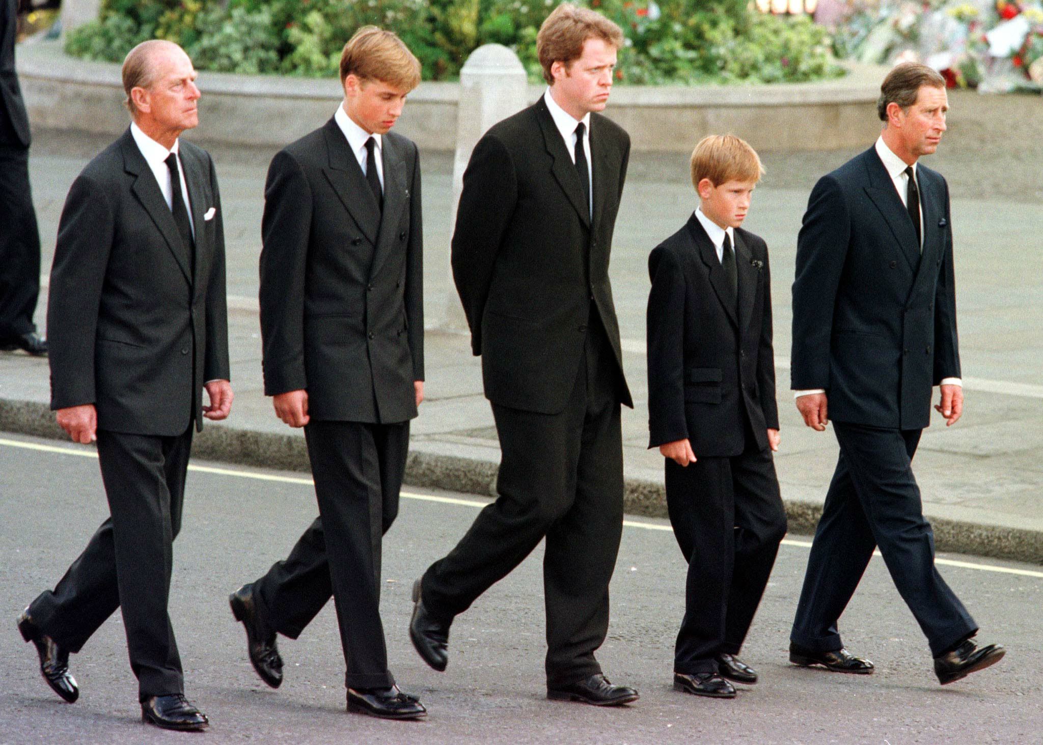Prince Philip, Prince William, Earl Spencer, Prince Harry and Prince Charles pictured walking outside Westminster Abbey during the funeral service for Diana, Princess of Wales, on September 6, 1997. / Source: Getty Images