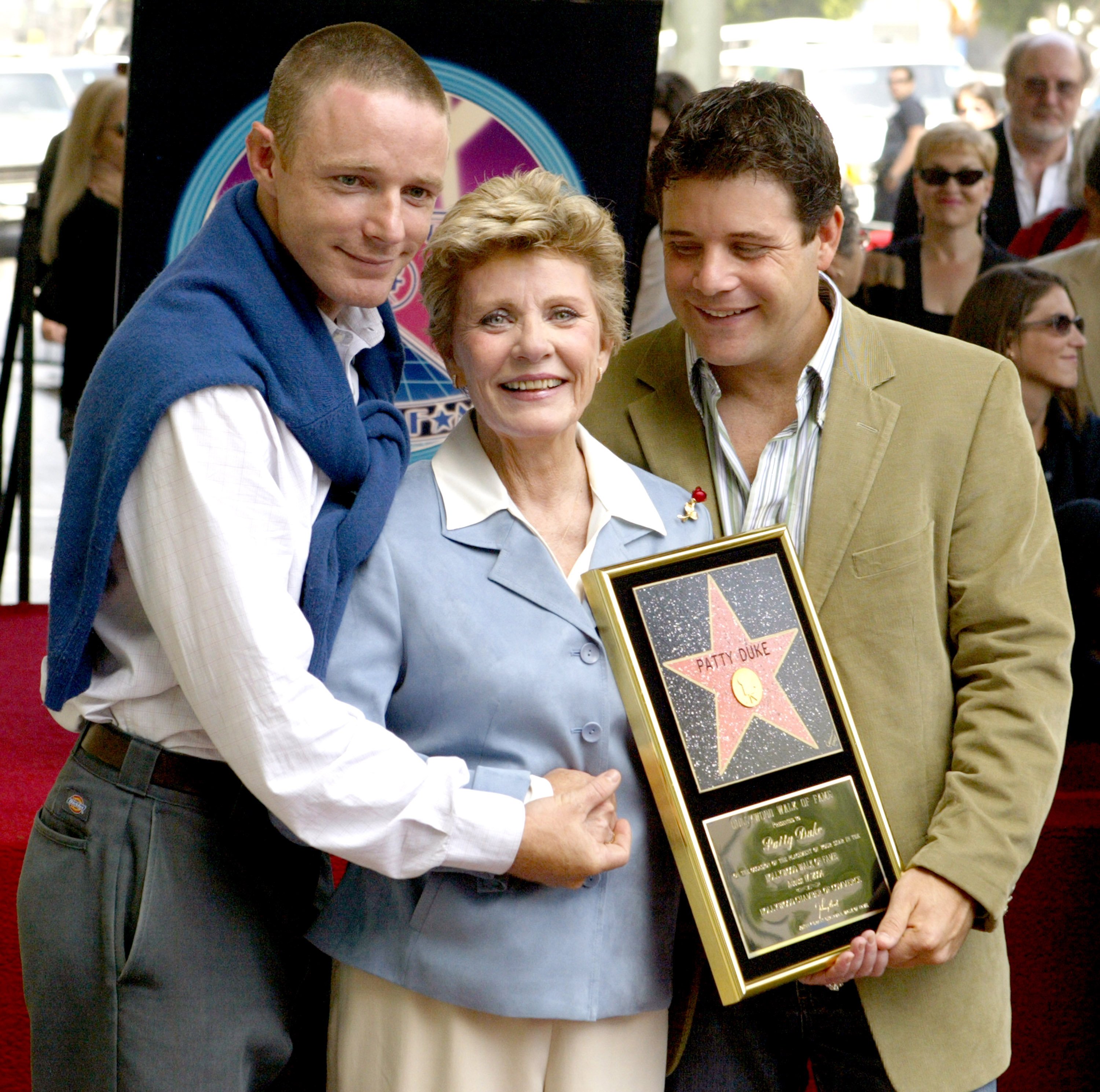Mackenzie Astin, Patty Duke, and Sean Astin when she received a Star on the Hollywood Walk of Fame in 2004. | Source: Getty Images