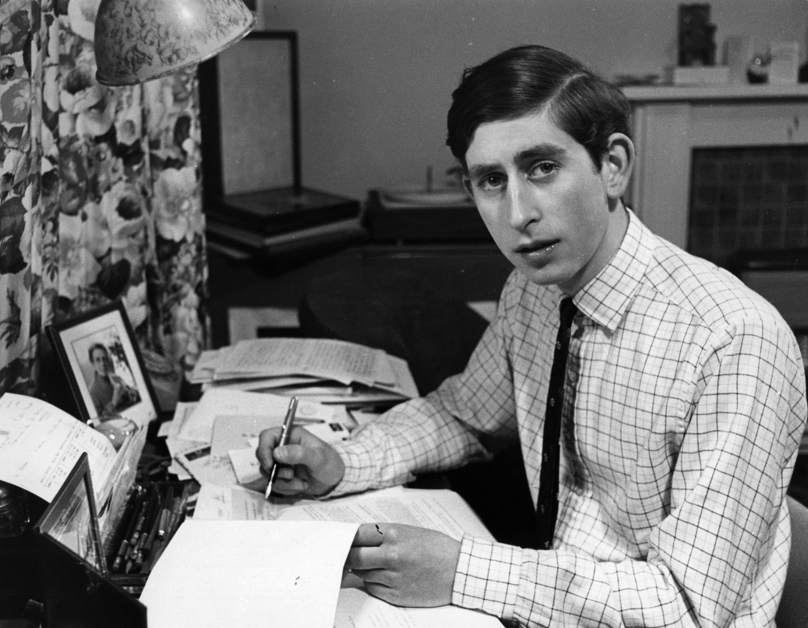Prince Charles, the Prince of Wales, seen here in his room at Trinity College when he was an undergraduate in 1969 | Source: Getty Images
