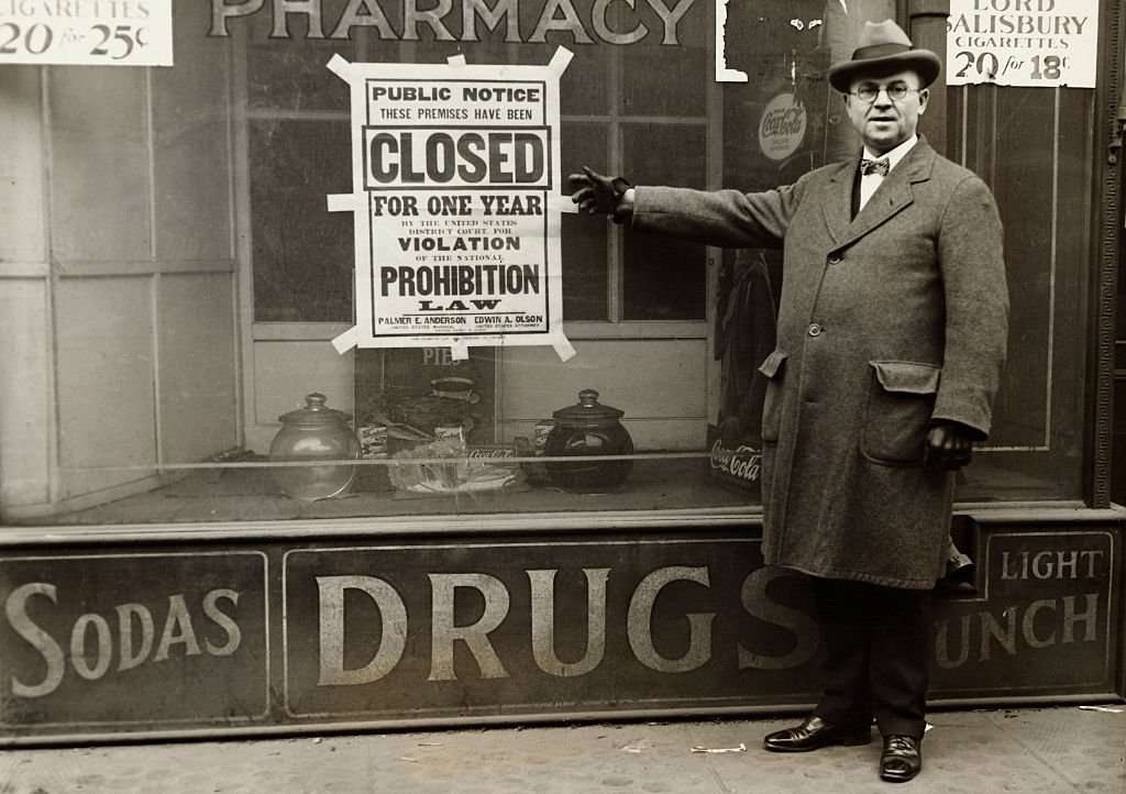 Man points to Prohibition sign, circa 1930s | Source: Getty Images