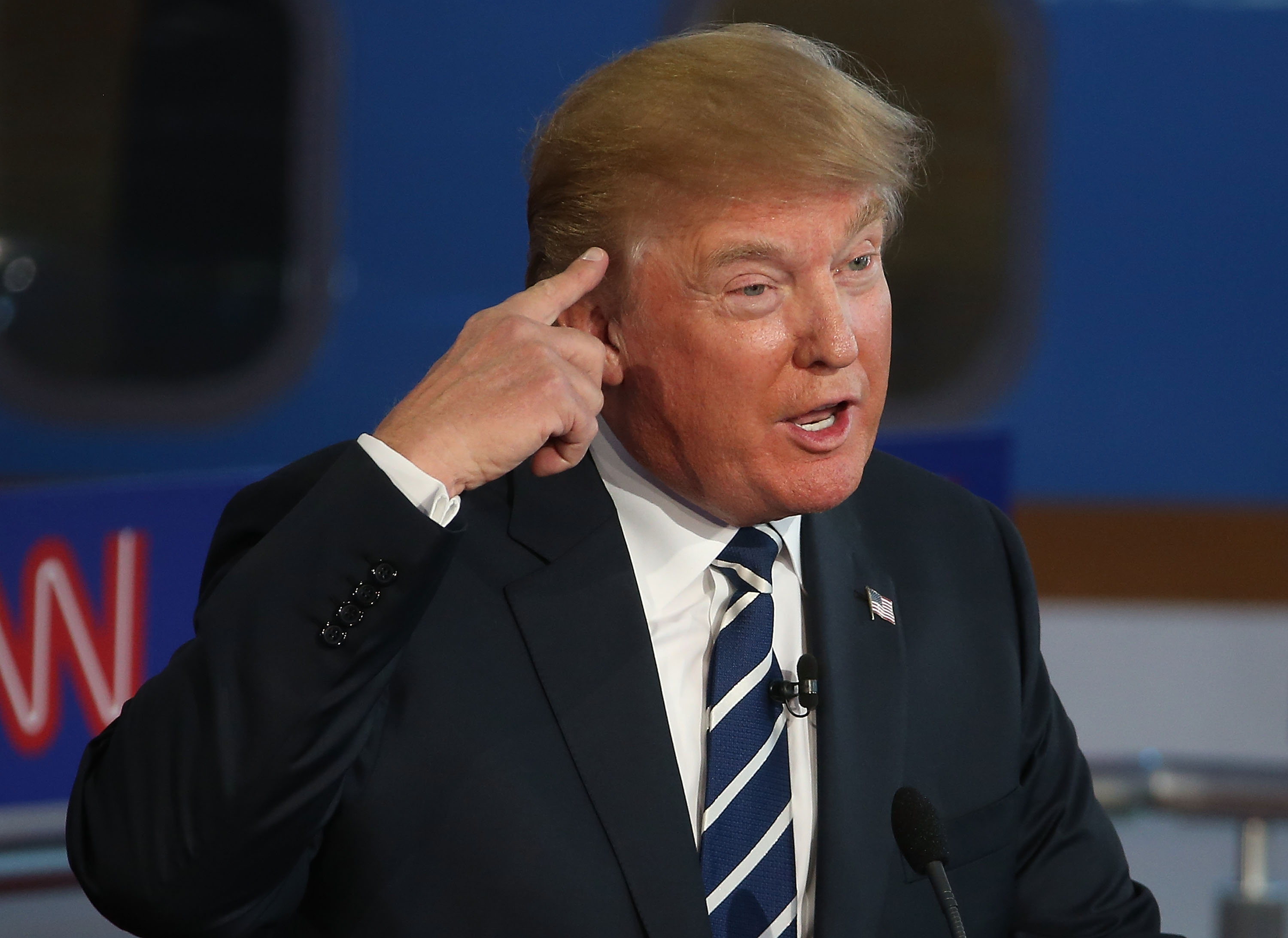 Trump’s swept hairstyle was already a familiar part of his public image during the 2015 campaign. That year, he addressed speculation about whether he wore a toupee by inviting a woman onstage to inspect his hair. | Source: Getty Images