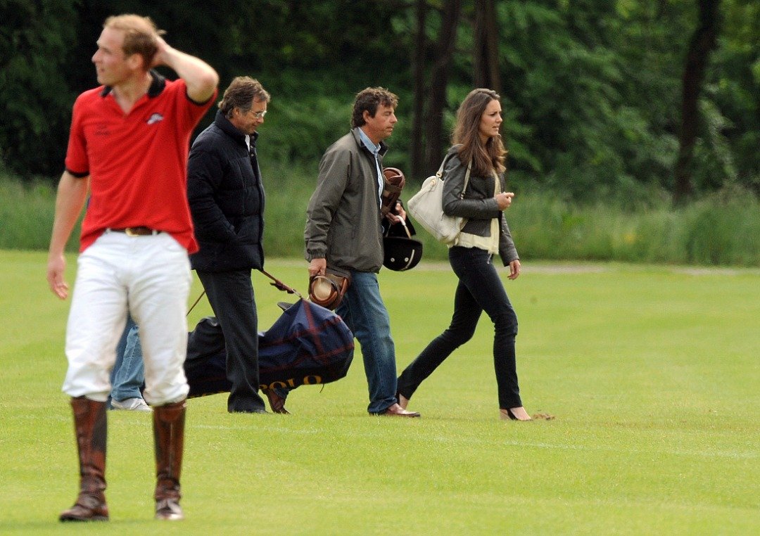Prince William looks puzzled as Kate Middleton walks past during a charity polo match at Cirencester Park Polo Club on June 7, 2009 in Cirencester, England. | Source: Getty Images