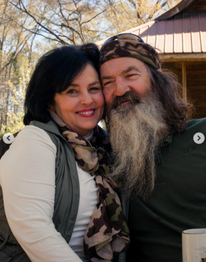Katy and Phil Robertson pose together, dated May 2025 | Source: instagram/legitsadierob