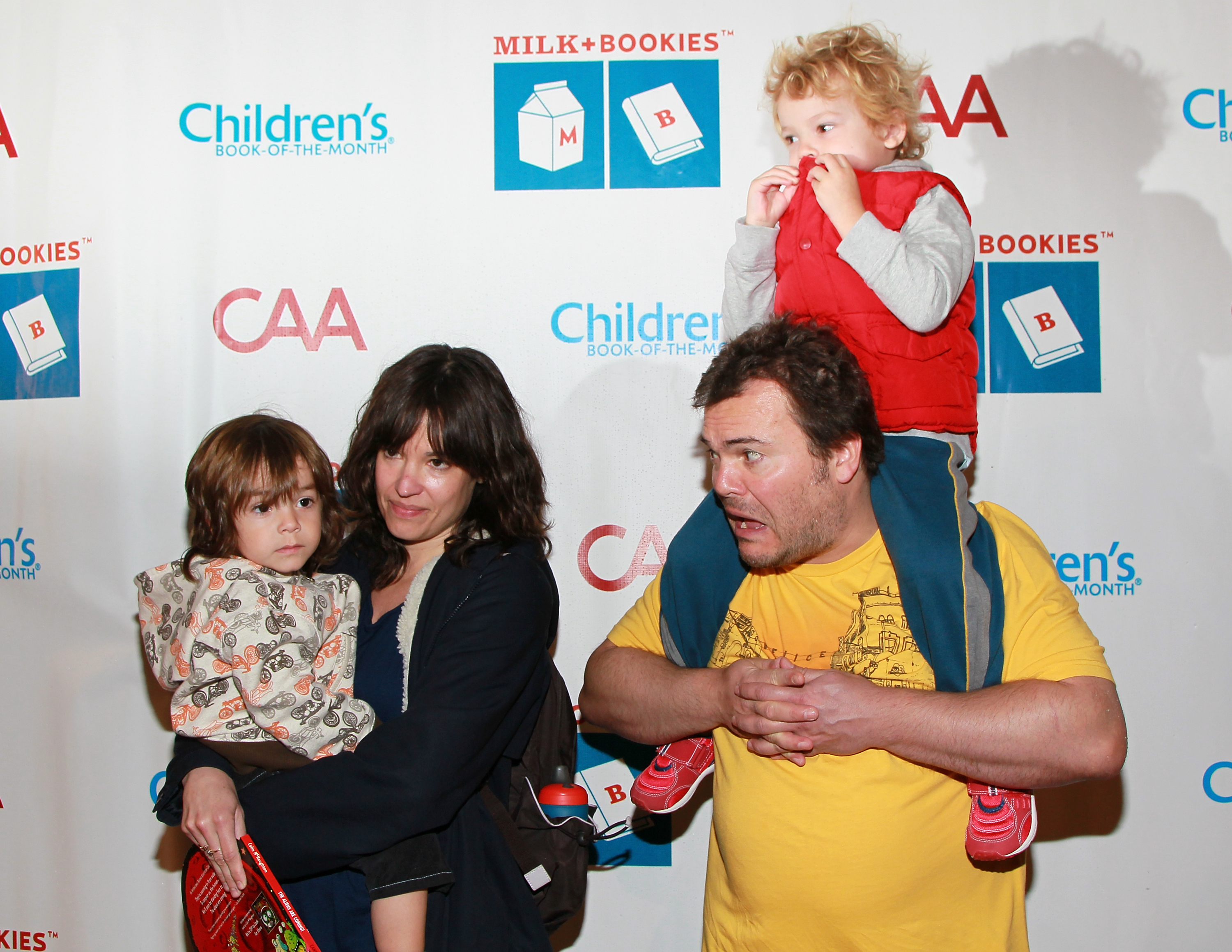 Actor Jack Black (R), son Samuel Black (on his shoulders) and wife Tanya Haden holding son Thomas Black at the 2nd Annual Milk + Bookies Story Time Celebration at the Skirball Cultural Center in Los Angeles, California on March 20, 2011 | Source: Getty Images
