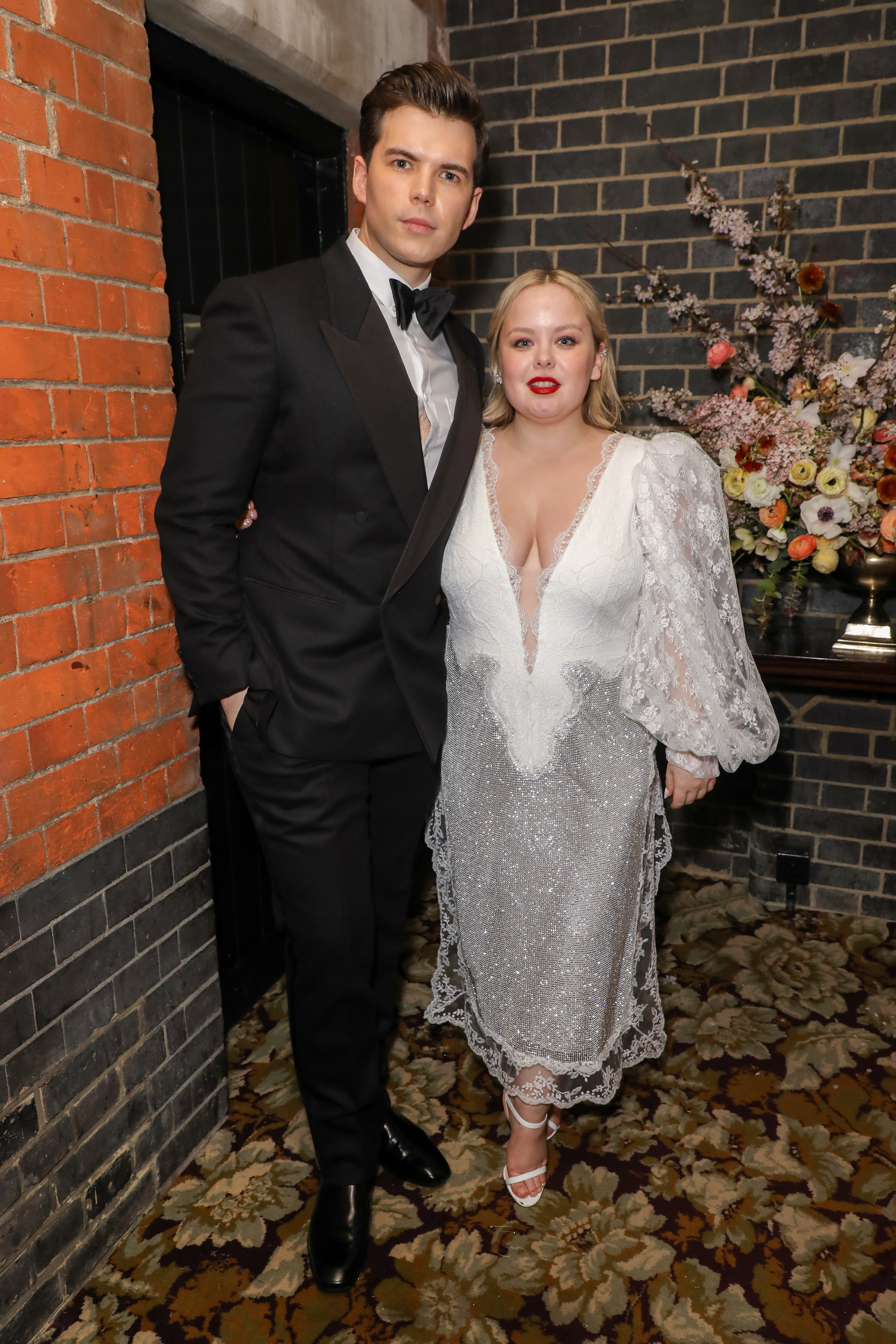 Luke Newton and Nicola Coughlan at the Netflix BAFTA 2022 party held at Chiltern Firehouse in London, England, on March 13, 2022. | Source: Getty Images